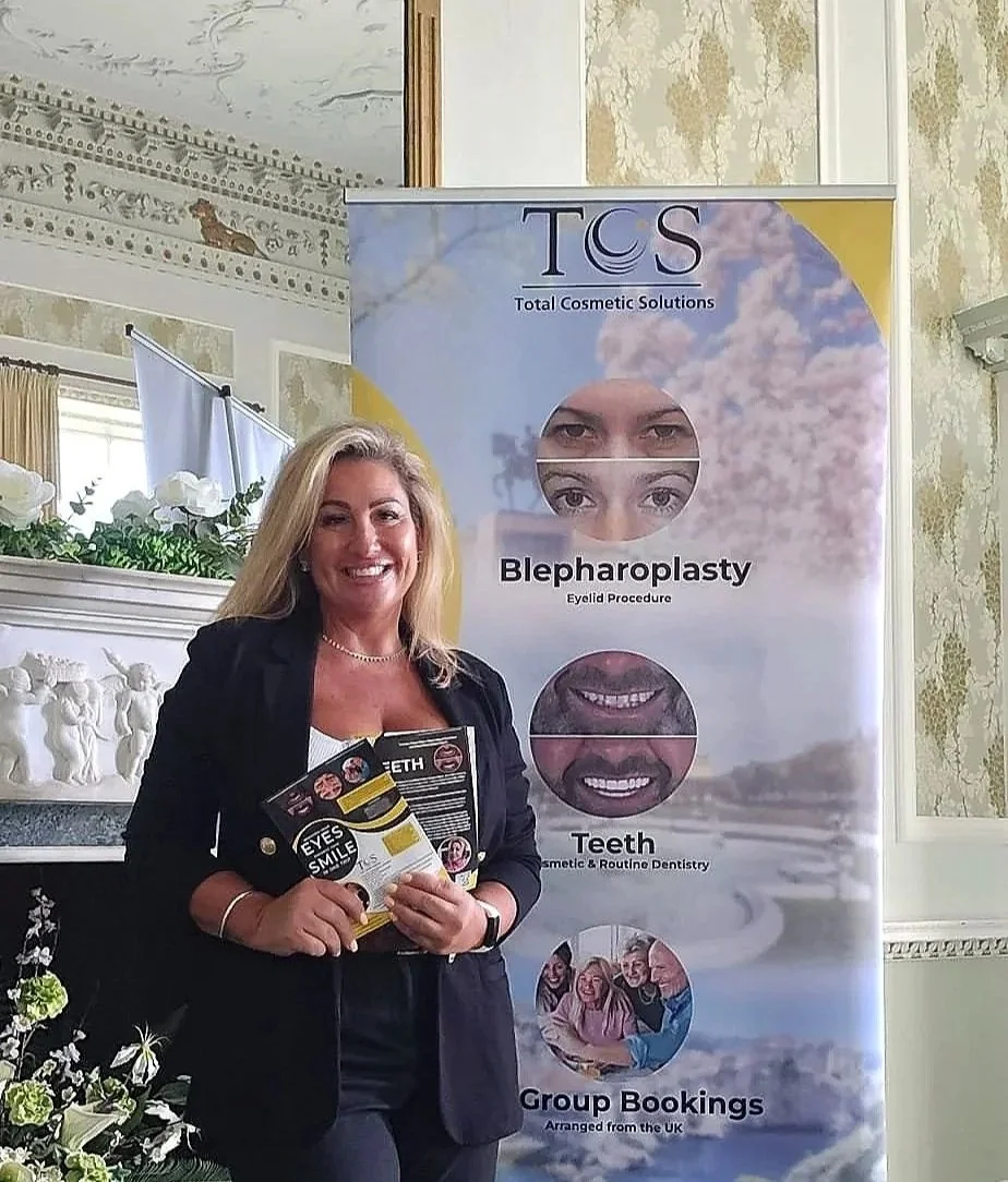 A smiling woman, Owner of TCS, standing next to a promotional banner for TCS, a cosmetic company. The banner highlights services like blepharoplasty, teeth, and group bookings.