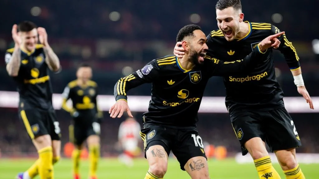 Arsenal 2                                            Man United 3              