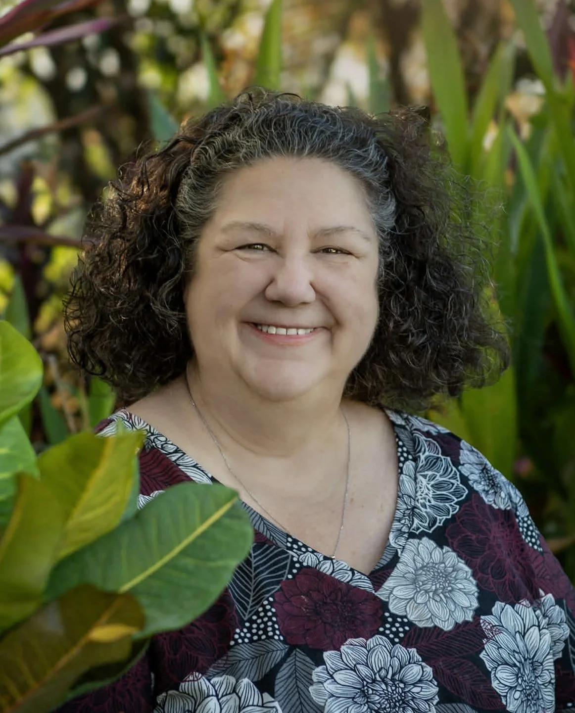 female therapist, clinician, middle-aged, friendly, calm, compassionate