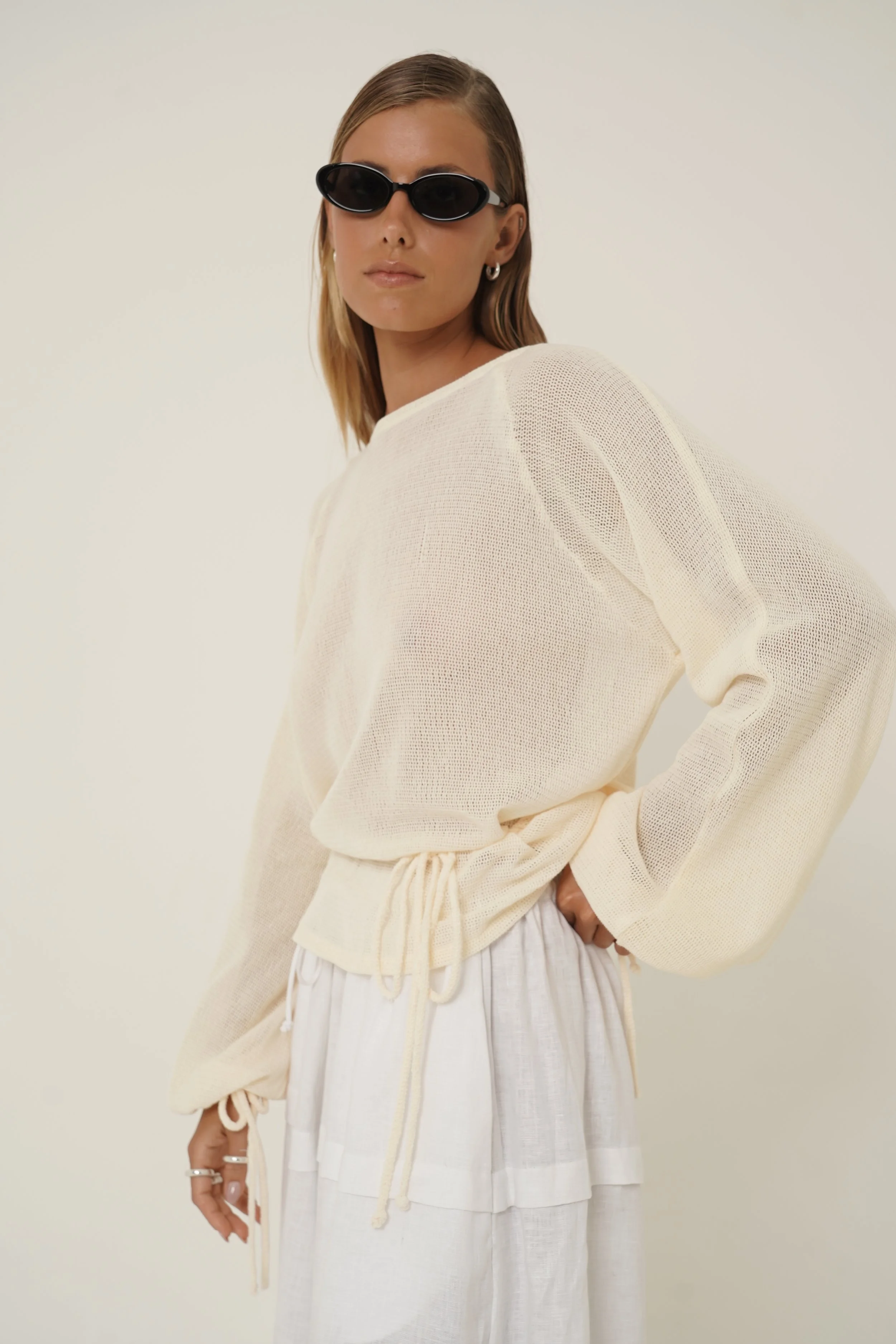 Woman wearing Kaos Shirt and Sunglasses - sideview