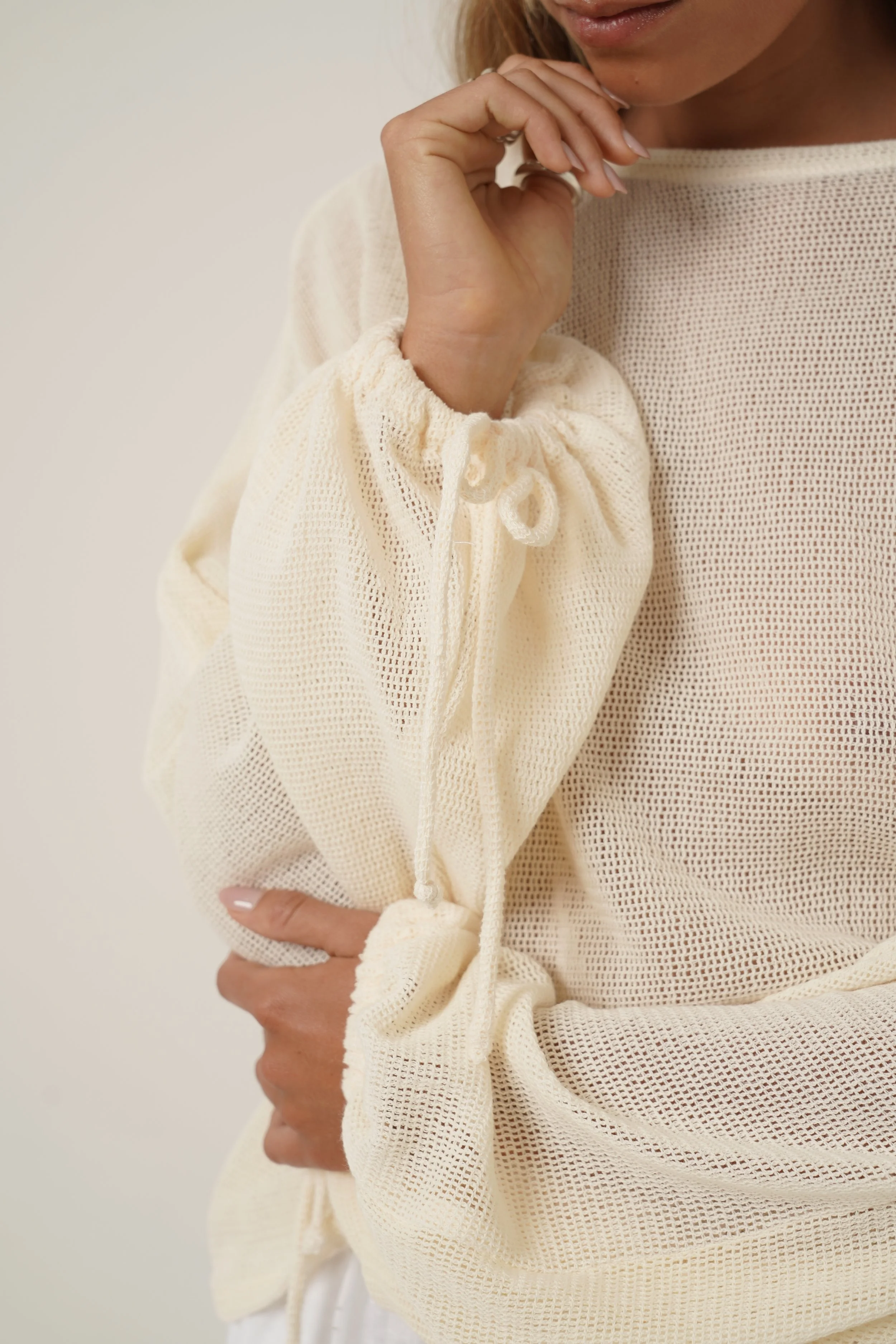 Sleeve detail of Kaos Shirt