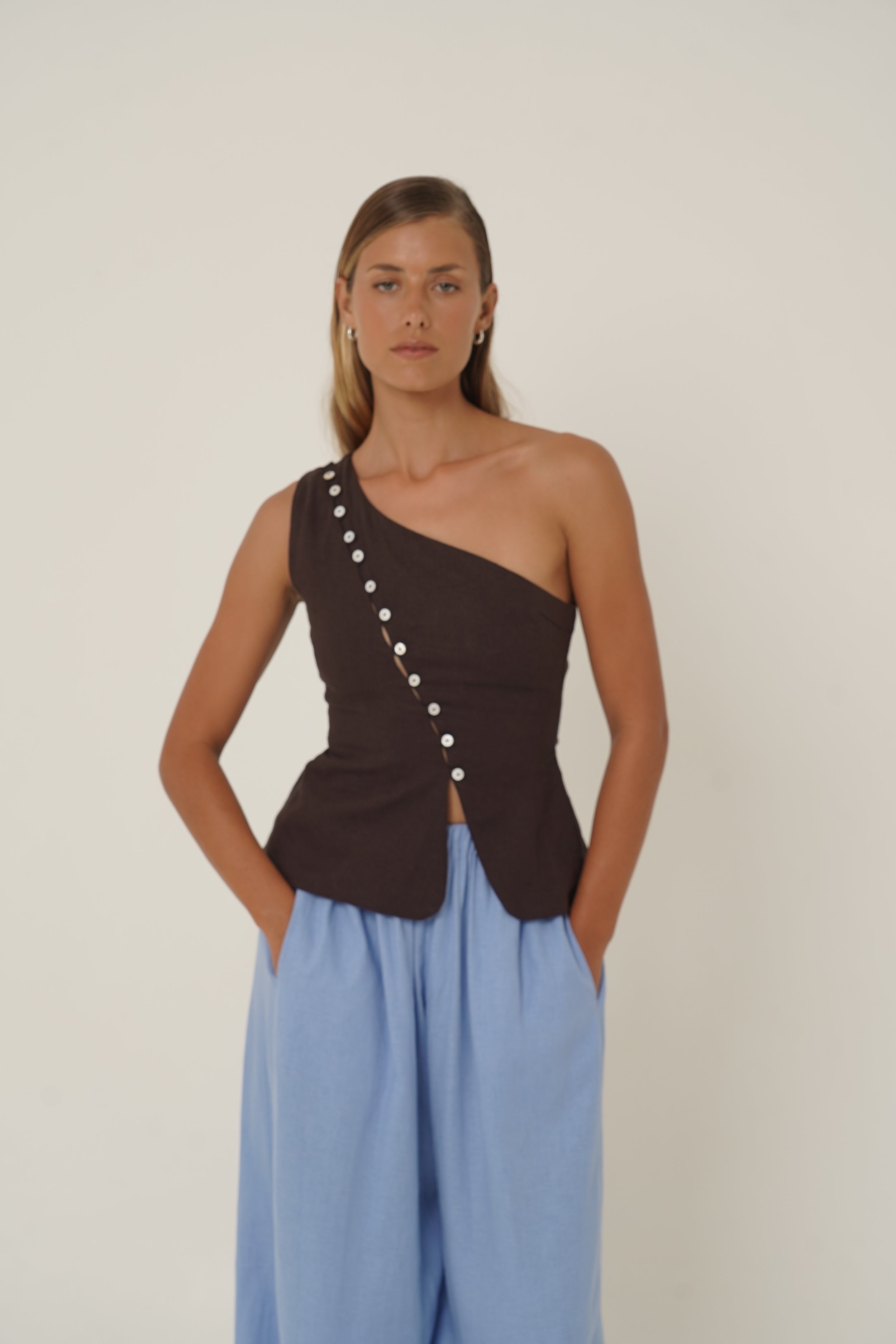 Woman wearing Sriani Vest Chocolate front view