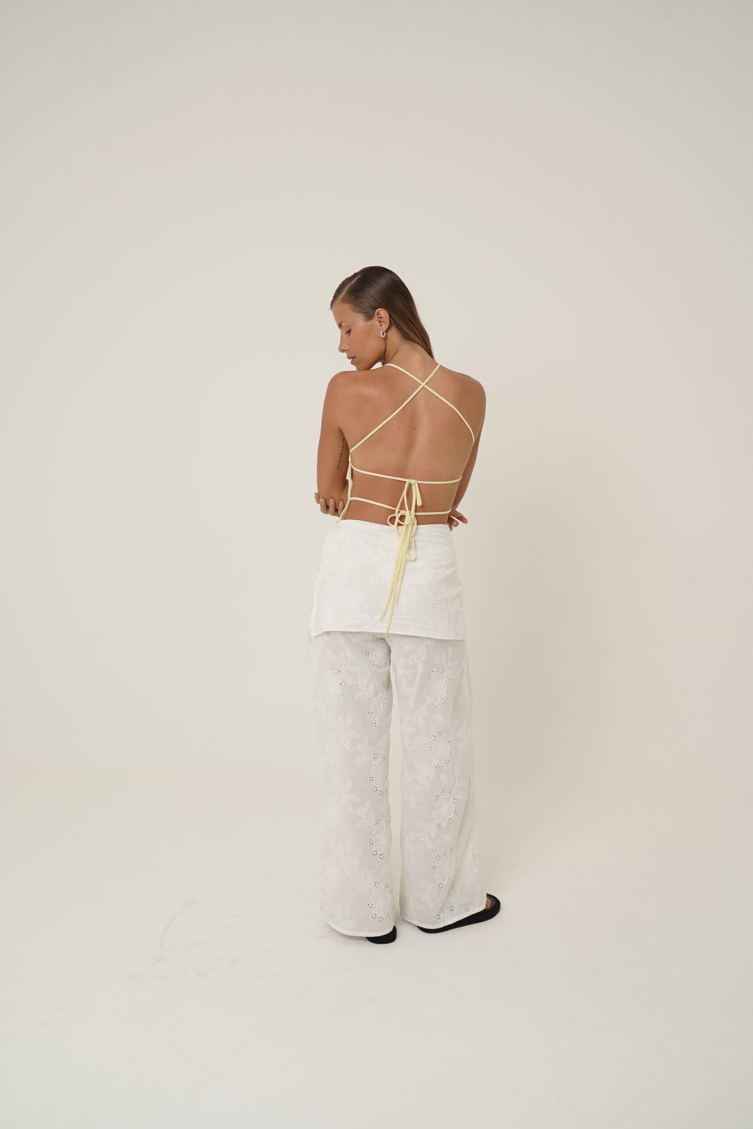 Back view of Chunari Pants in embroidered cotton