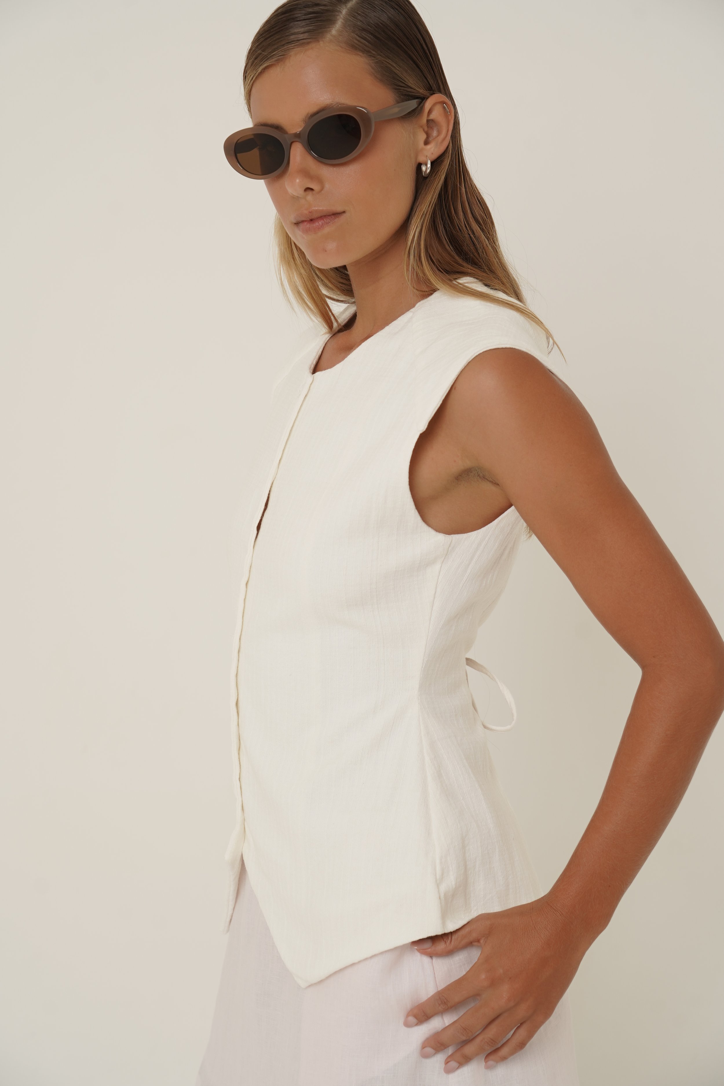 Woman wearing Basmati Vest side view