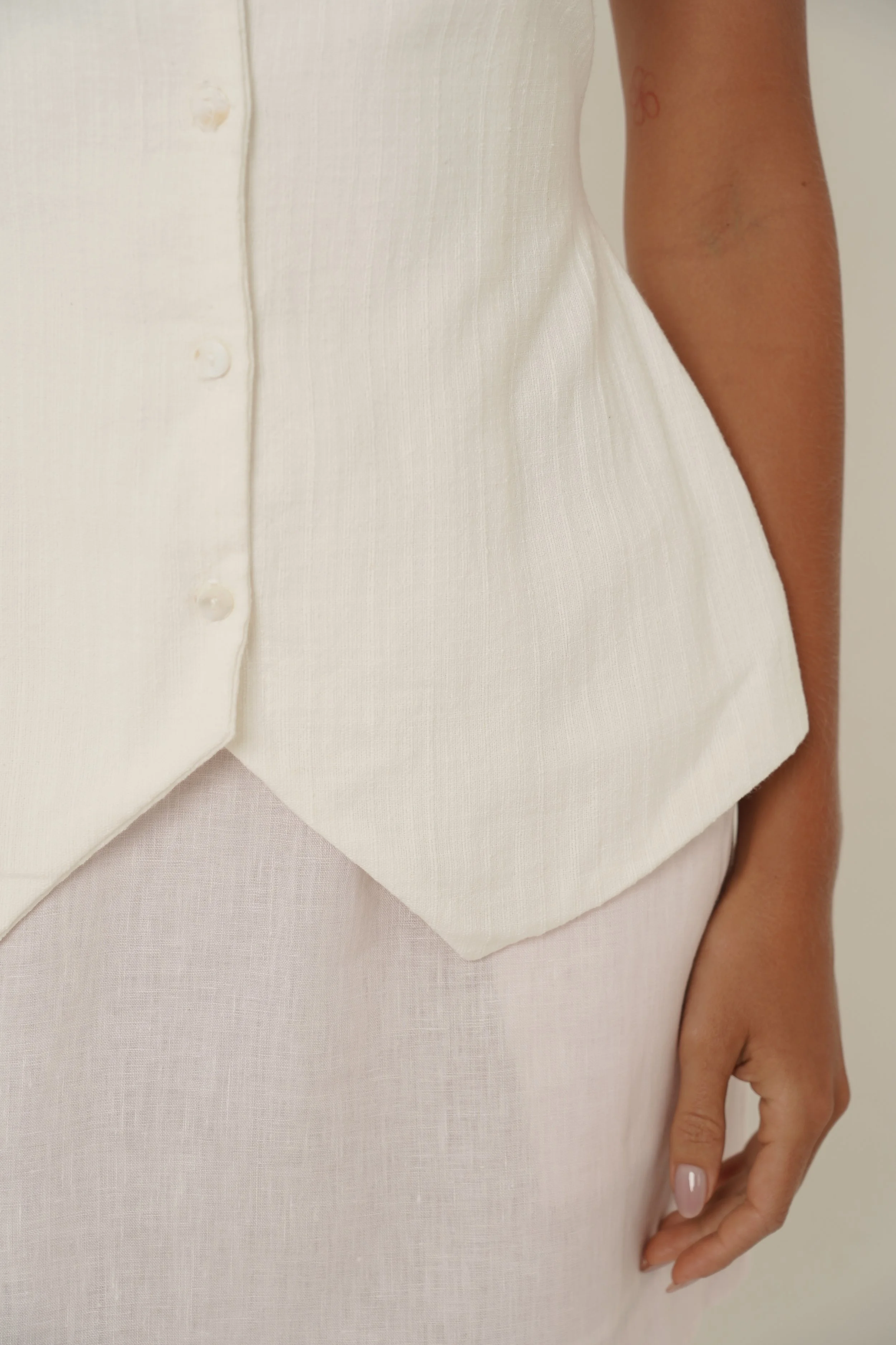 Woman wearing Basmati Vest hem view