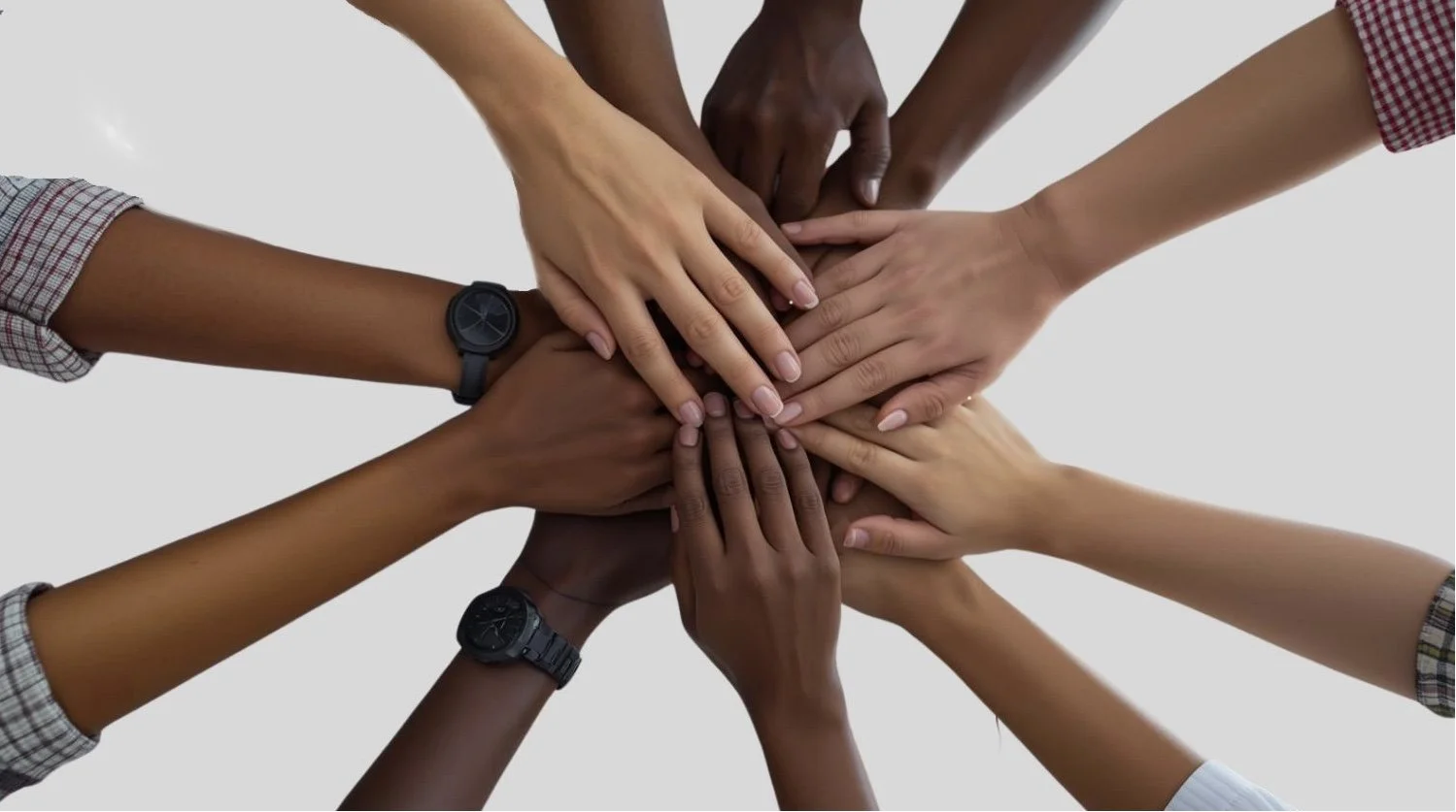 A circle of diverse hands stacked together in the center, symbolizing unity, teamwork, and collective support.