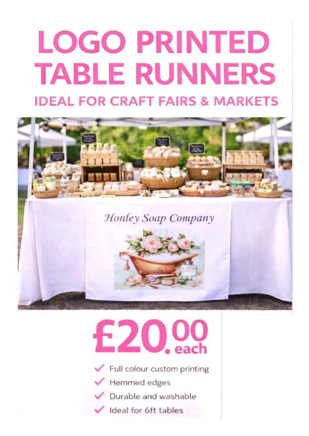 Poster advertising logo printed table runners for craft fairs and markets. Features a photo of a market stall with various soap products on a table, decorated with a banner for Honey Soap Company, and pricing at 20 pounds each with listed features.