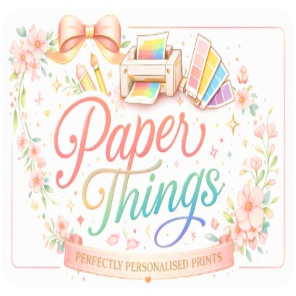 Colorful sign for Paper Things, featuring a print shop with a printer, color swatches, pencils, and a pink bow. The design is decorated with pink flowers and sparkles, with the text 'Paper Things' and a banner stating 'Perfectly Personalized Prints.'