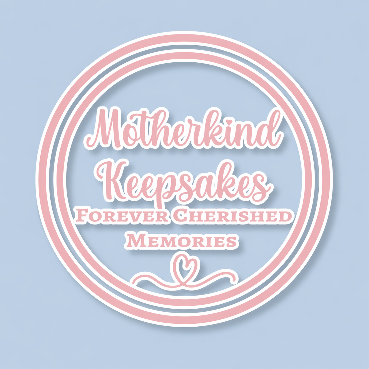 Pastel pink and white text on a blue background reads 'Motherkind Keepsakes Forever Cherished Memories' inside a pink and white circular border with a small heart design at the bottom.