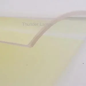 Close-up of a yellow object with the partial text 'Thunder Lamp' visible.