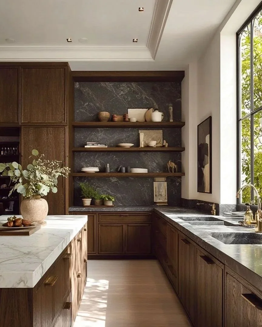 Dark wood bespoke kitchen with marble island, black stone open shelving and brass detailing