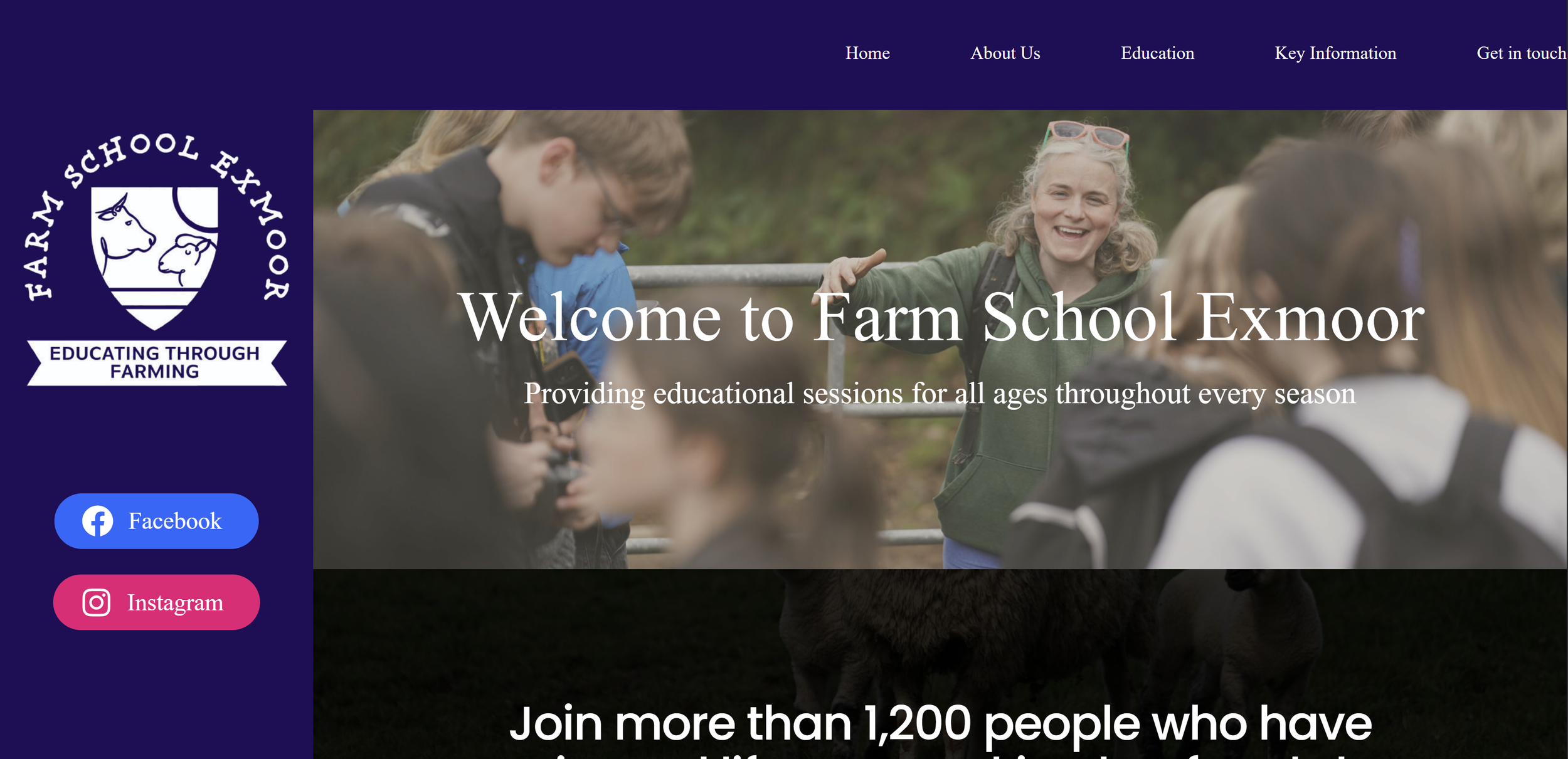 Farm School Exmoor website homepage with a group of people outdoors, woman smiling, children gathered around, and farm animals in the background. Logo on the left side with sheep face, farm school name, and social media icons for Facebook and Instagram.
