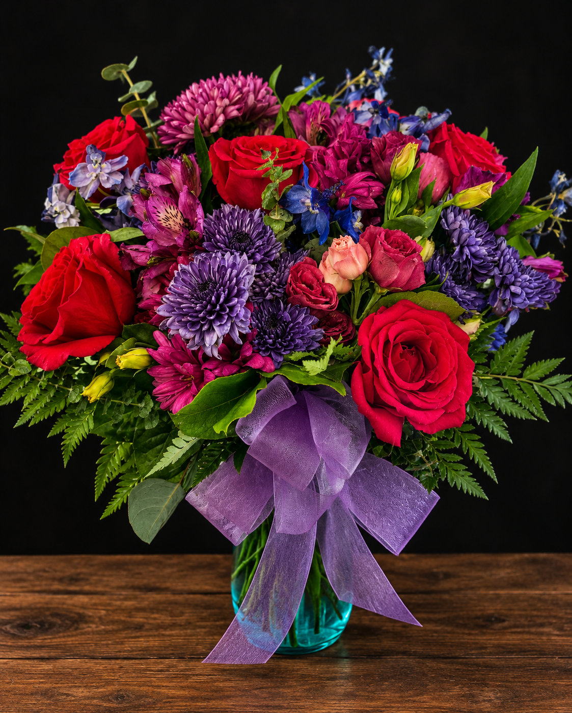 Vibrant Bouquet in Teal Vase.png