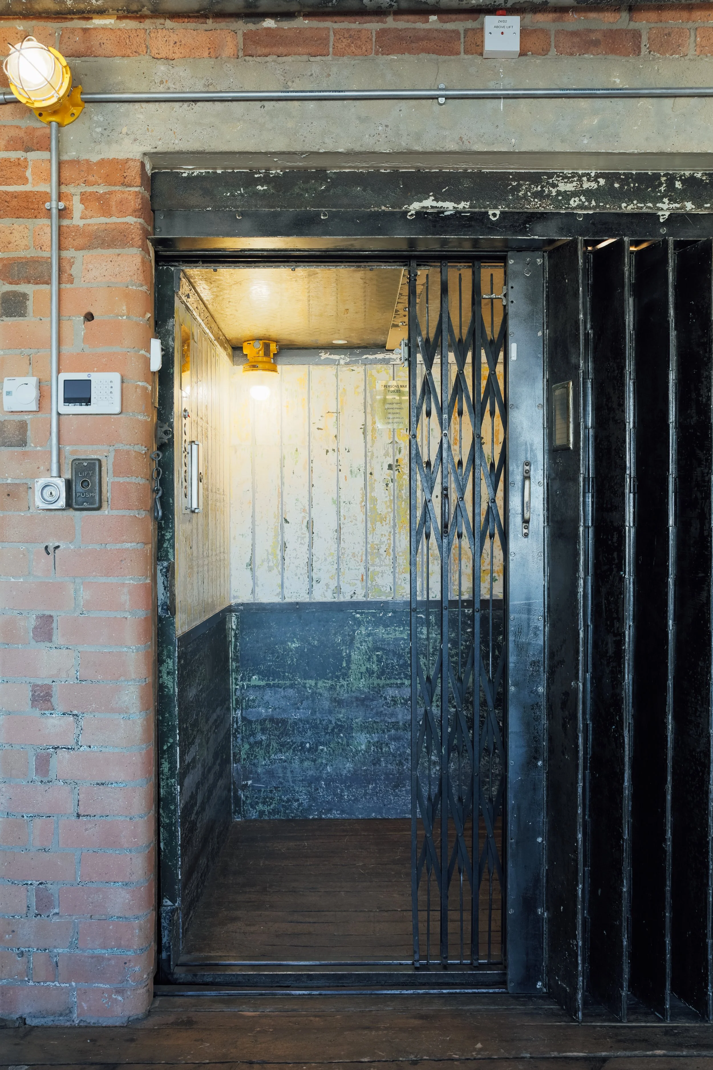 Reach the loft via vintage elevator
