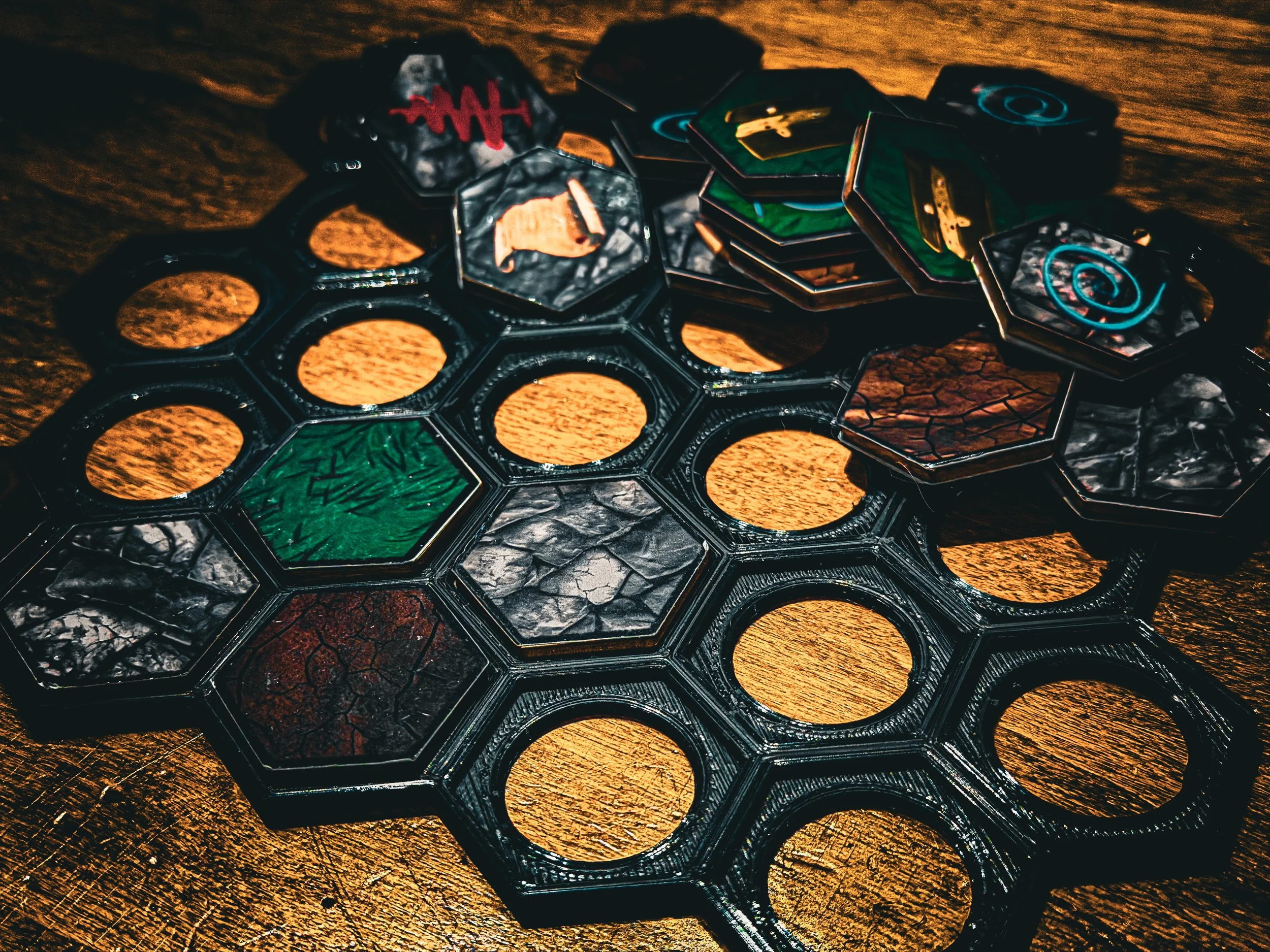 Fawnalore modular tile tray with hex tiles scattered around during board setup.