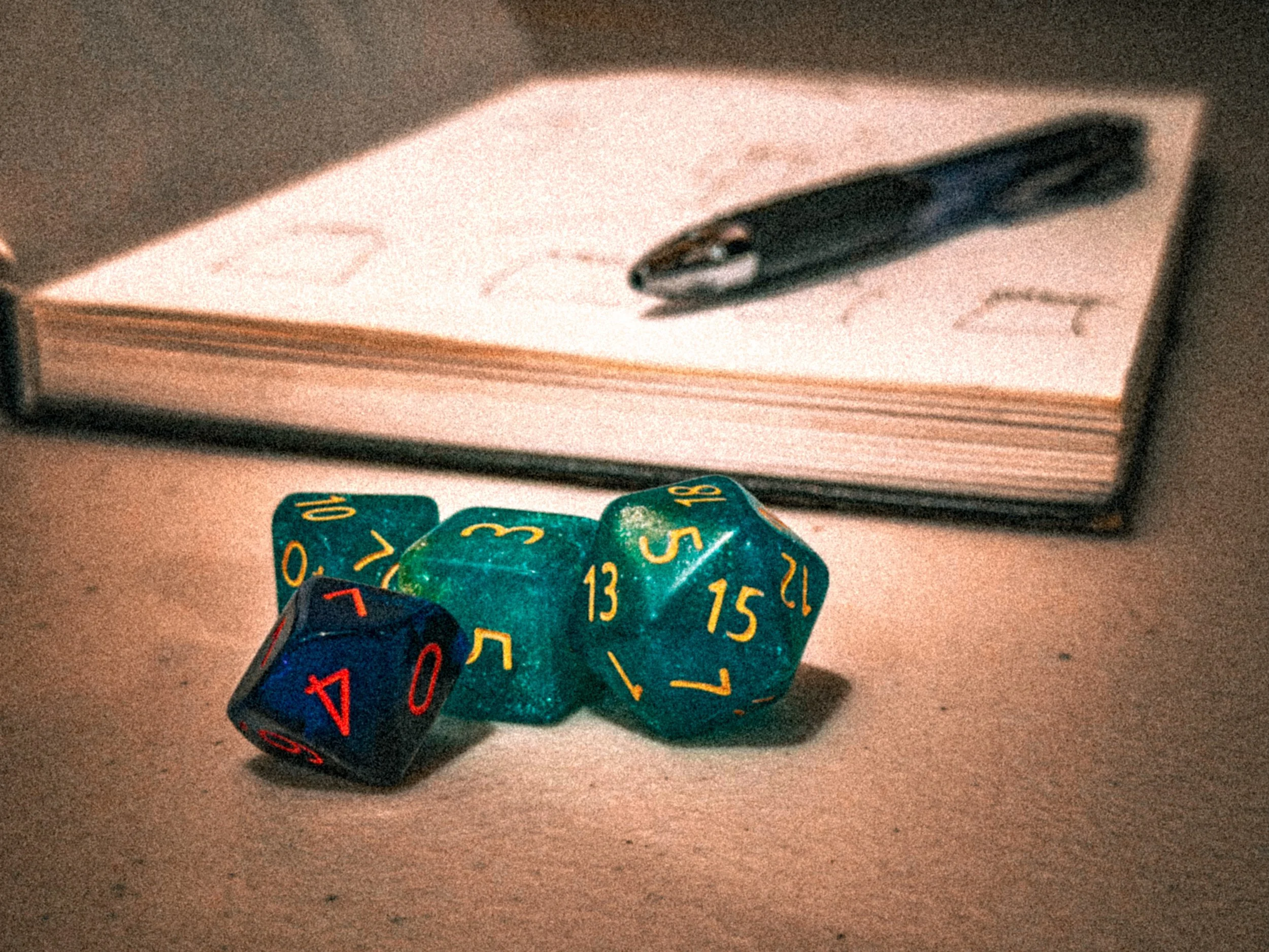 Early design notes and dice that inspired Fawnalore’s learn-as-you-play storytelling strategy game.