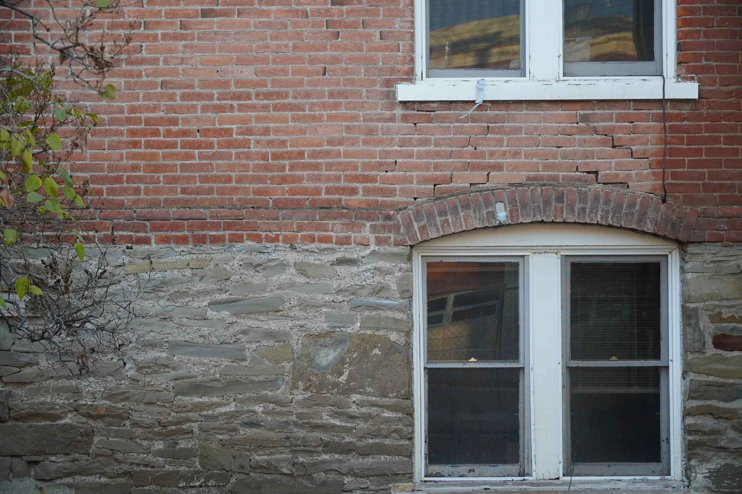 Historical masonry at Taylor Hall showing complex material sourcing and problem-solving skill.