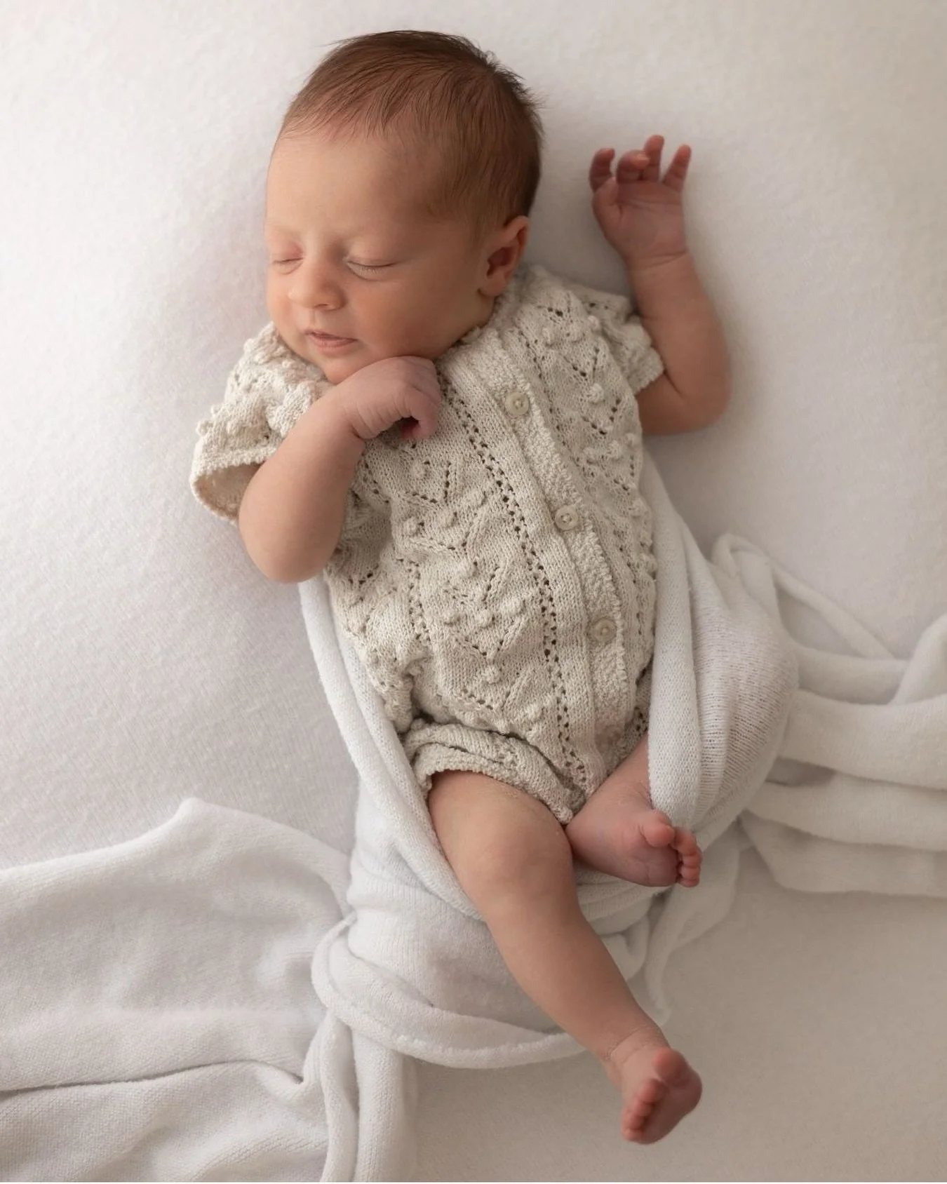 A perfect example of where I am not too precious about the perfect swaddle, I love it when little ones kick them off and show who they are.