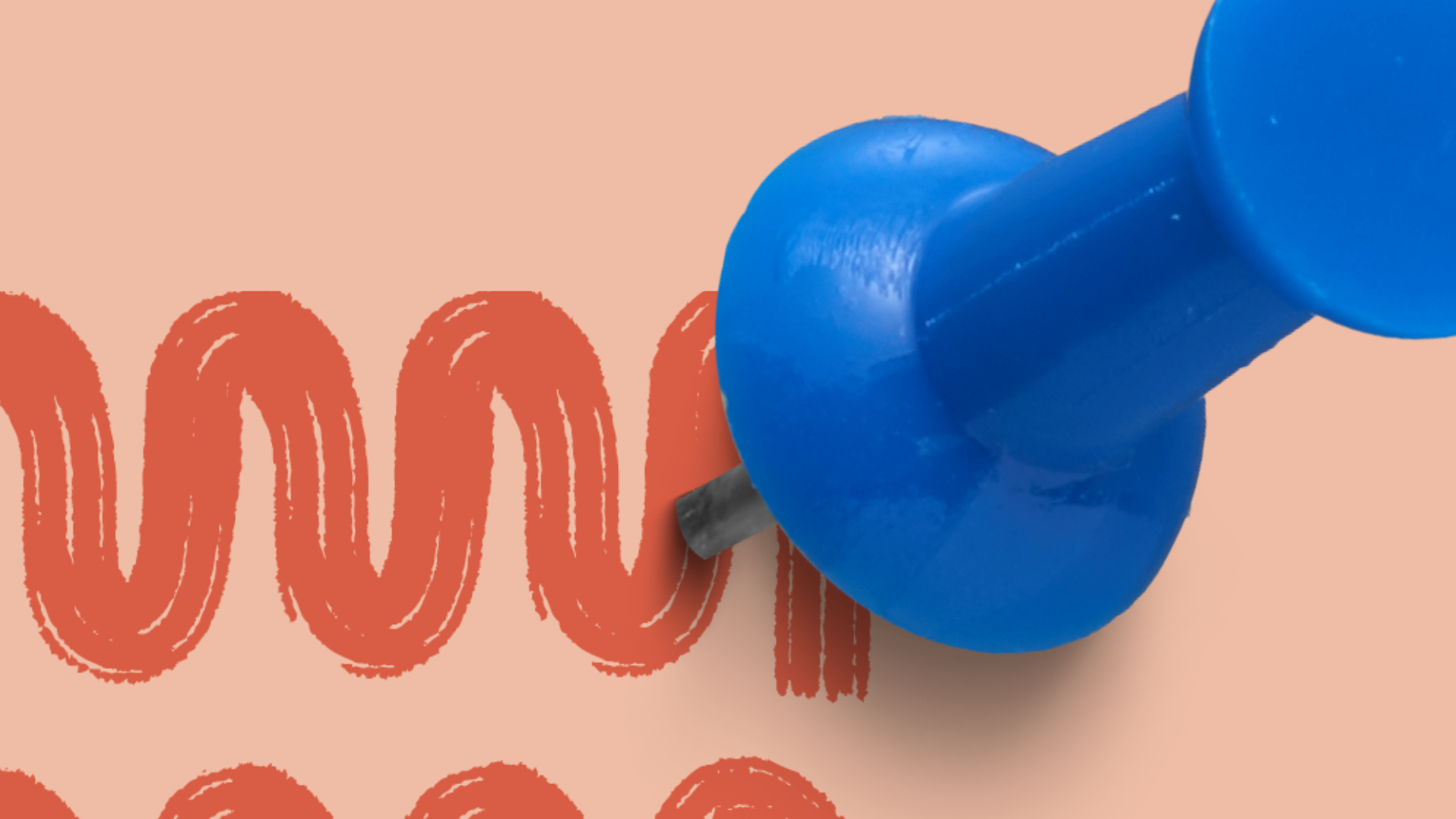 A blue push pin on a beige background.