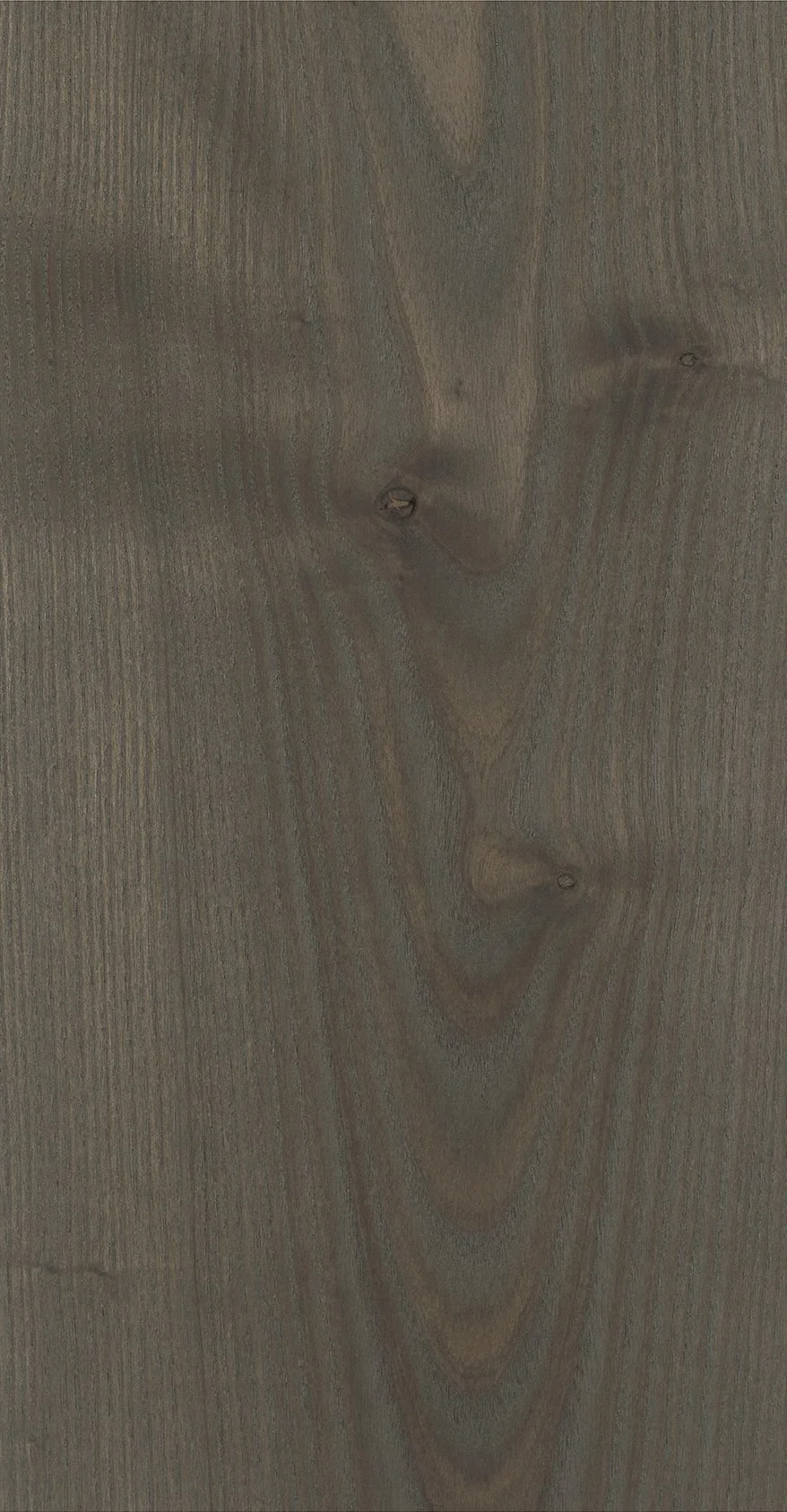 Superficie de madera con vetas y nudos visibles.