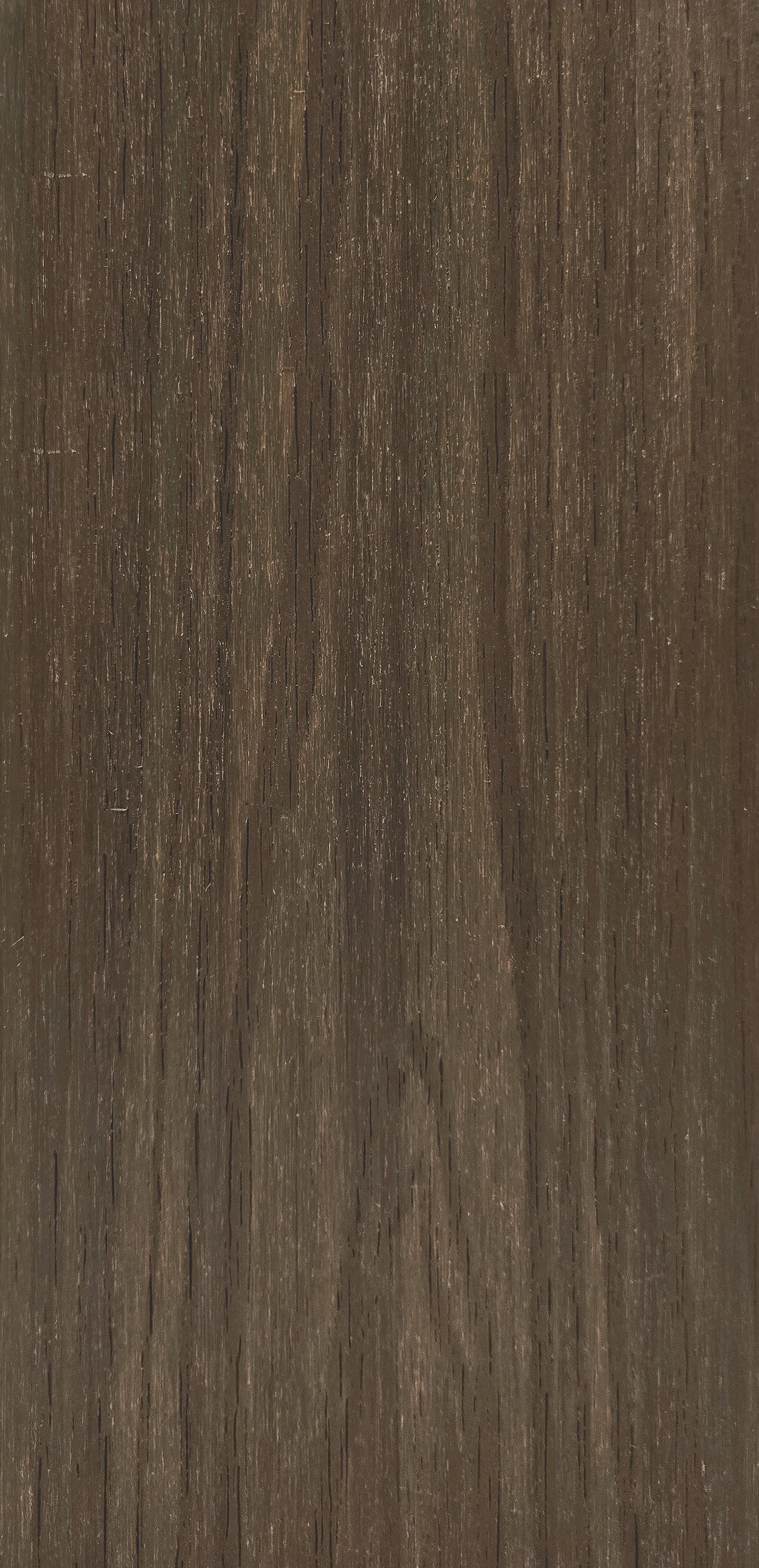 Superficie de madera marrón con veta y textura visible.