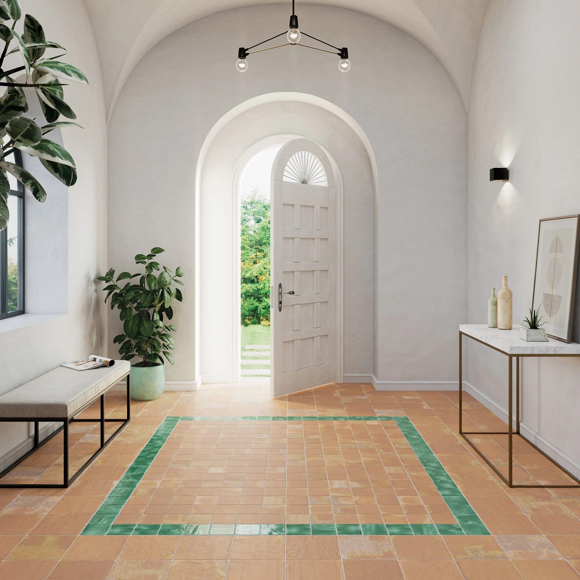 Vista de un vestíbulo con suelo de baldosas terracota, una entrada de madera blanca, un diseño de baldosas verdes formando un marco en el piso, decoración minimalista con plantas, un banco con cojín, y paredes blancas con iluminación moderna.