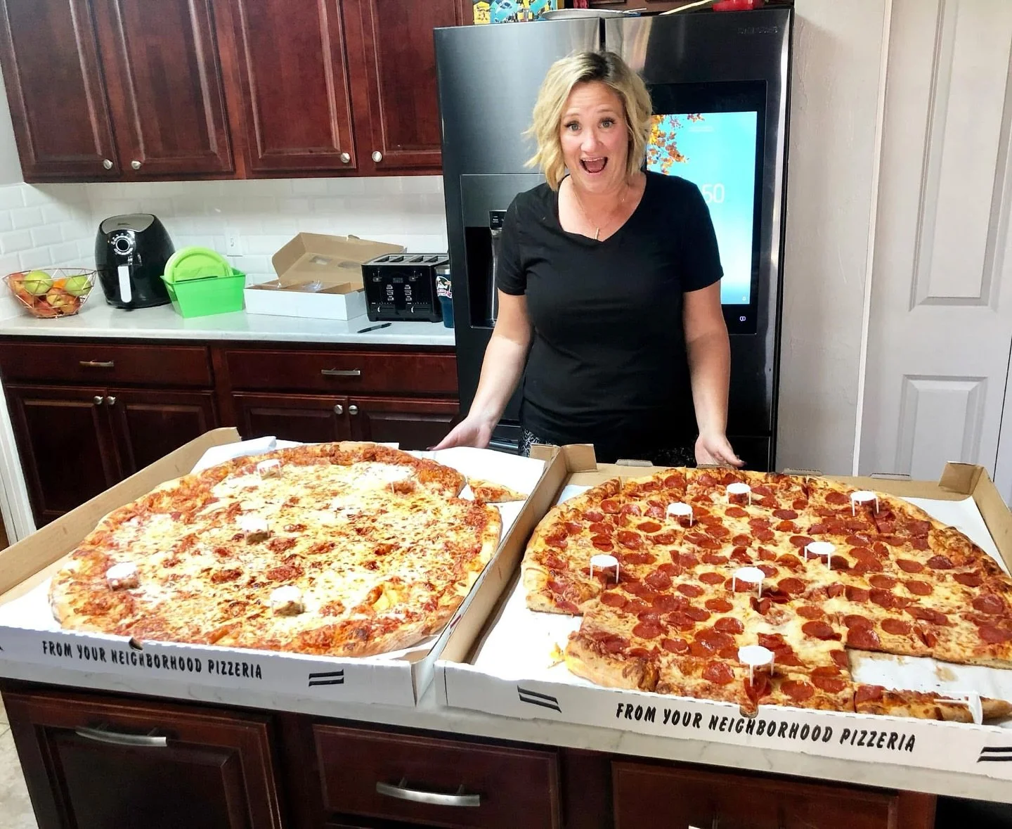 Maria two large pizzas.jpg