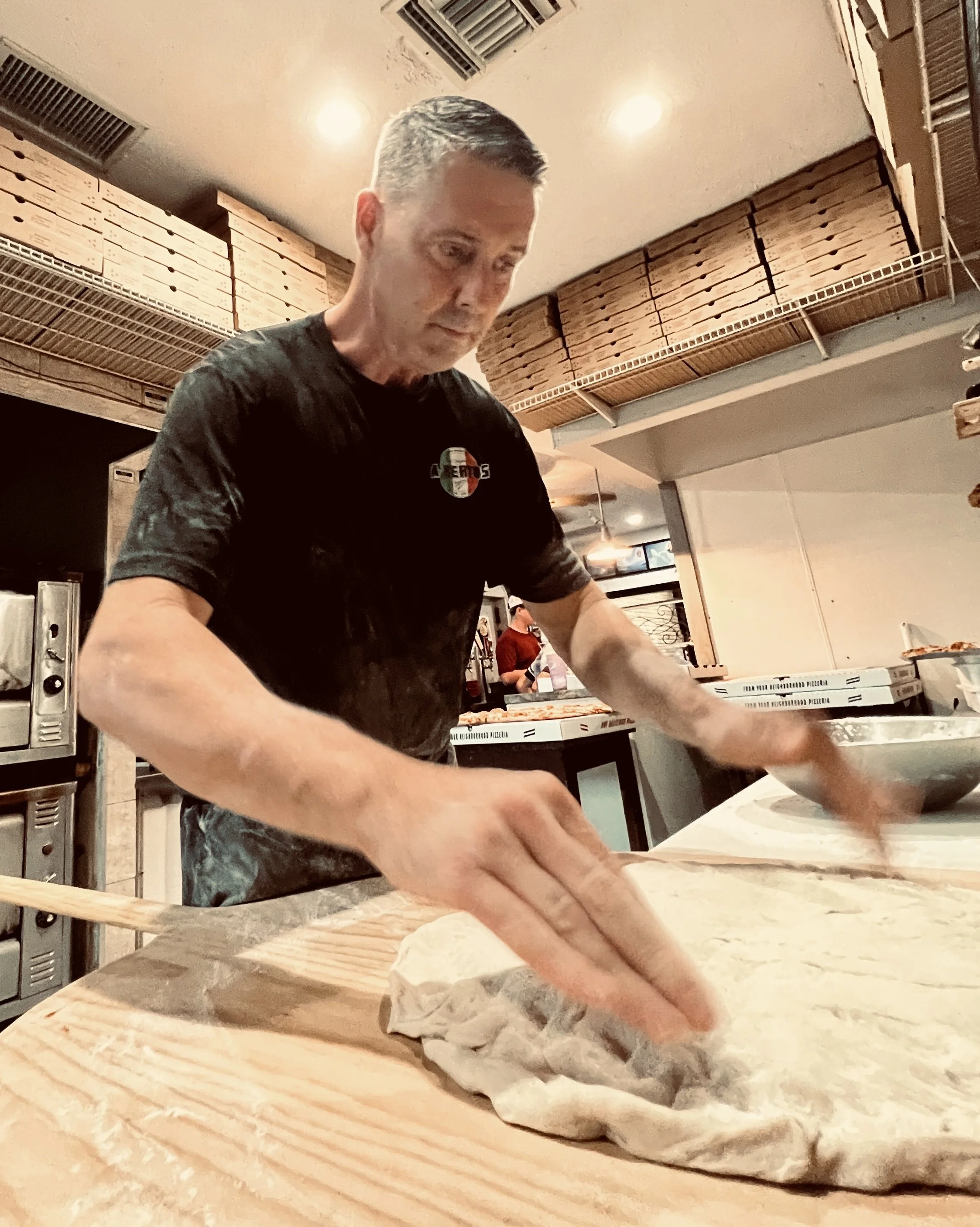 Owner Ryan making pizza.JPG