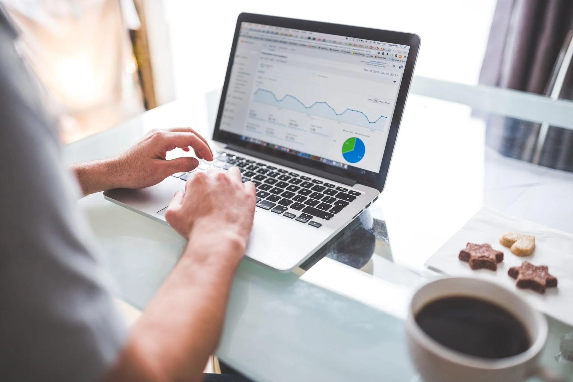 Laptop displaying spreadsheets