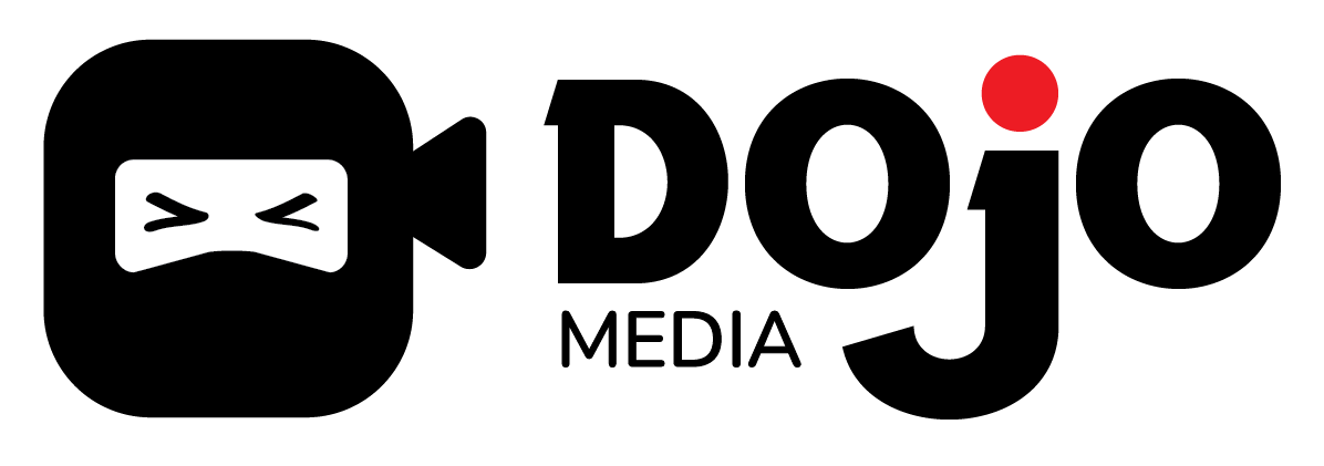 Smiley face with closed eyes and a wide open mouth, surrounded by black background and red circle in top right corner.