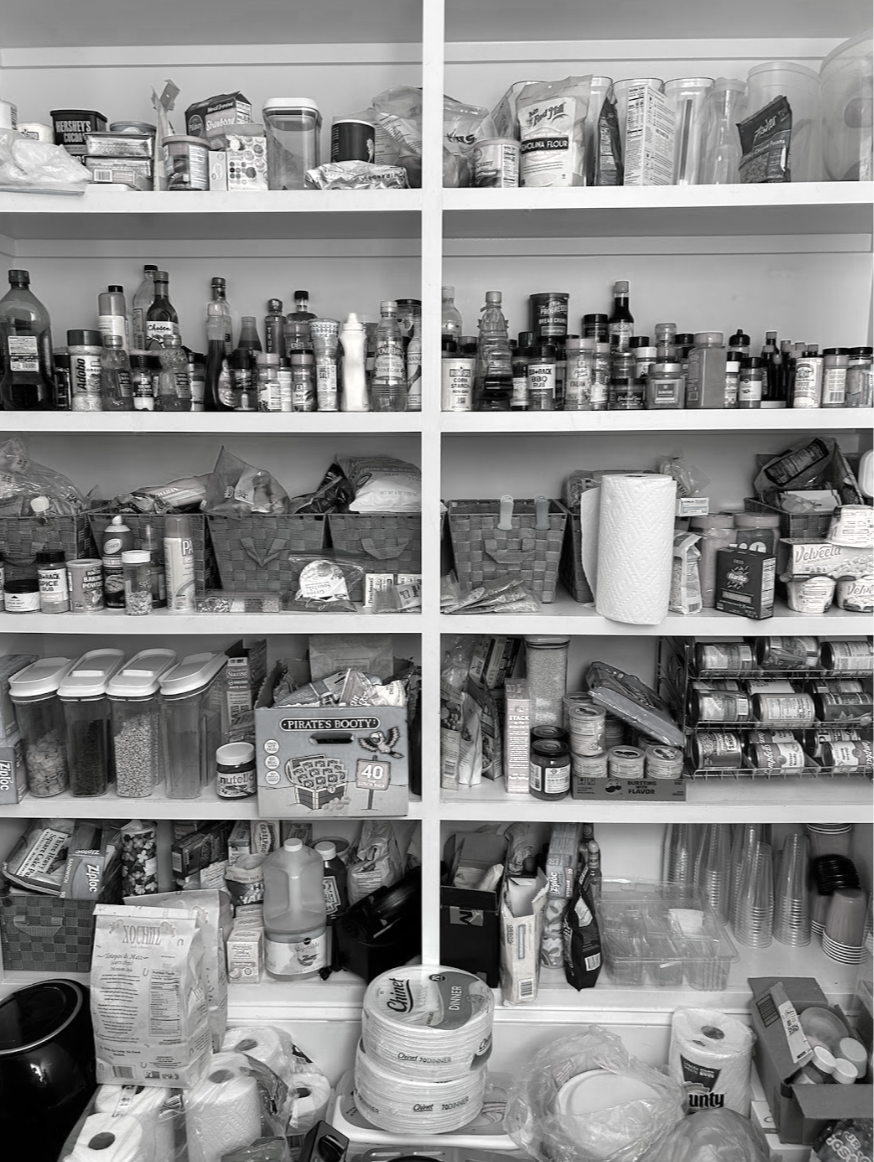 Before shot of a cluttered pantry in need of professional organization
