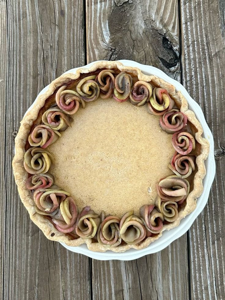 Apple florets on a ricotta honey pie!! Lots of fun autumnal spices.jpg