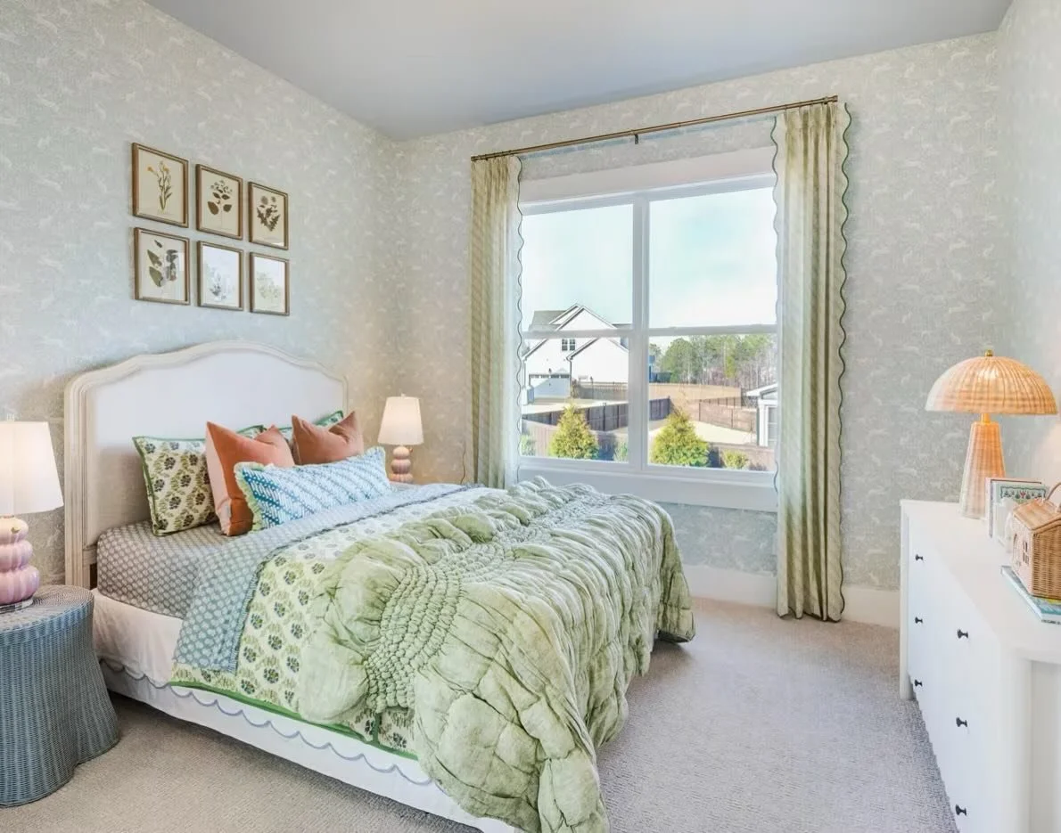 Pattern play helping to create a whimsical bedroom space that we never want to leave!