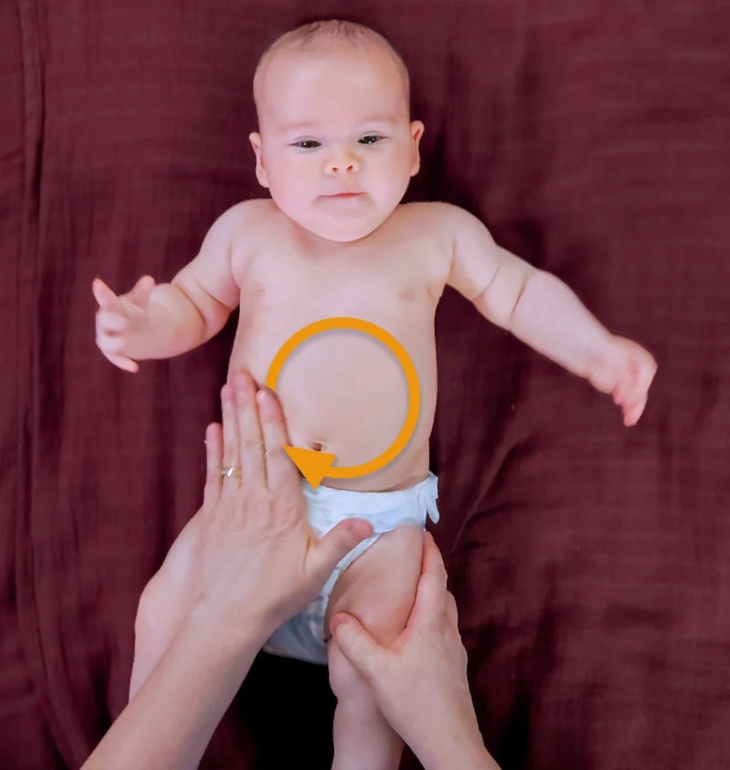 Dr. Melanie demonstrating an abdominal baby massage stroke to support digestion and help relieve gas using gentle, guided technique