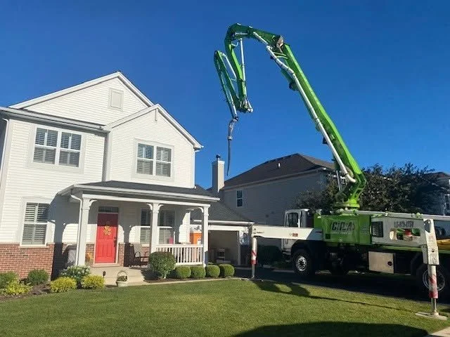 Concrete Pump Over the House