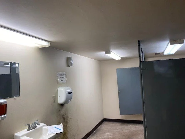 Before of men's bathroom