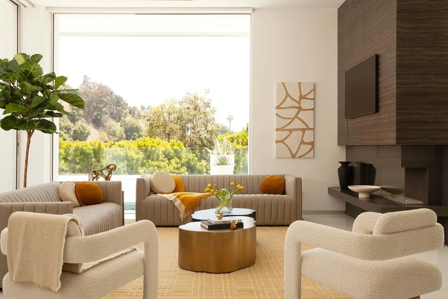 One of my favorite rooms to design is the living room, a space where you can evoke a specific lifestyle and feeling. A monochromatic palette of butterscotch yellow, yellow ochre, bronze, and brass uplifts you and welcomes you to lounge. #livingroom #