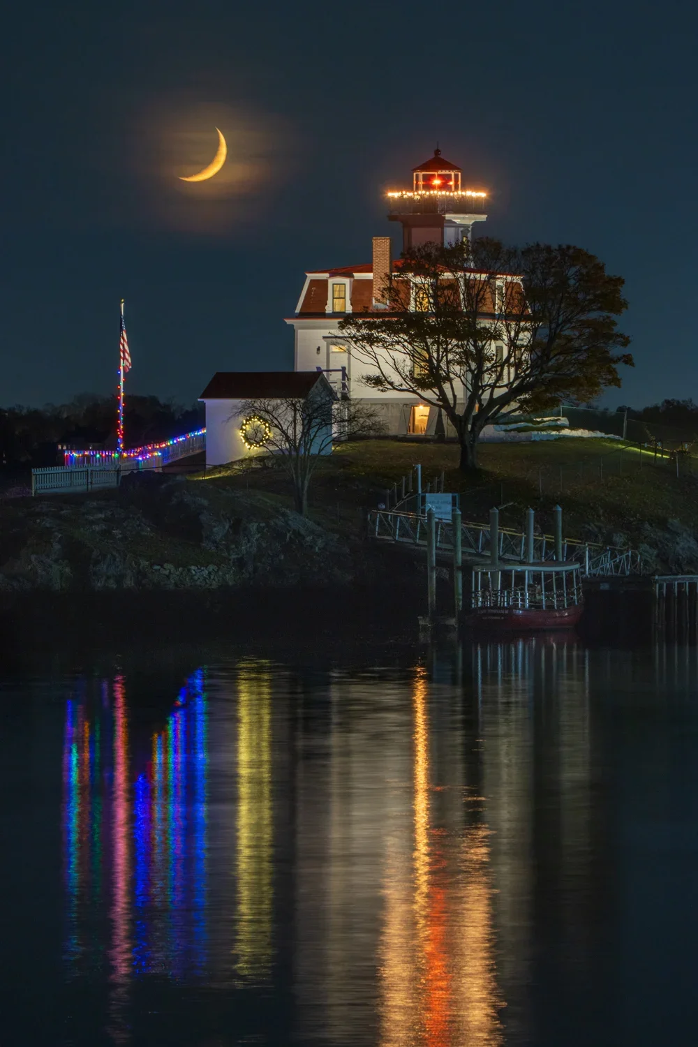 Pomham Rocks Lighthouse with crescent moon