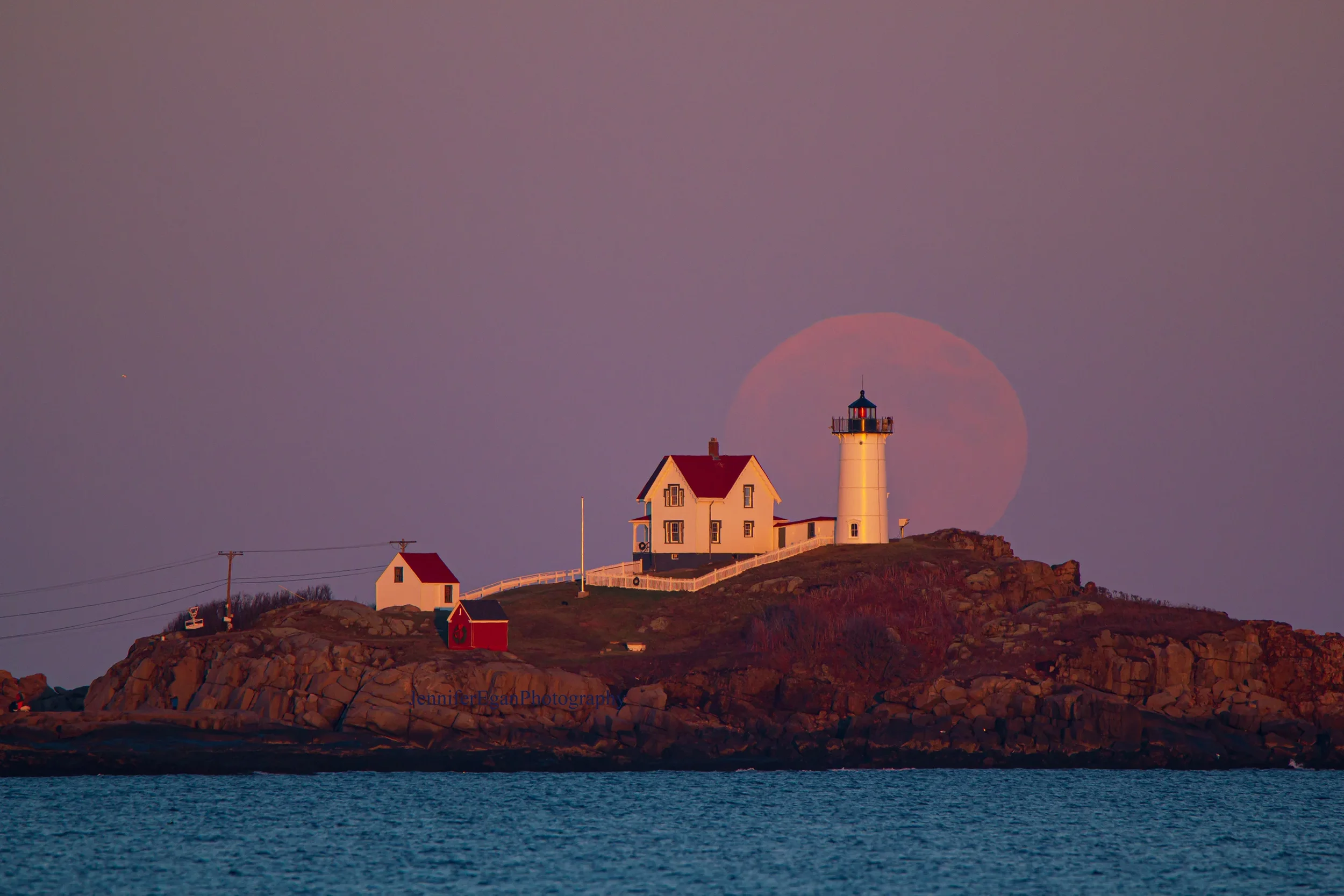 Ghost moon over Nubble Lighthouse