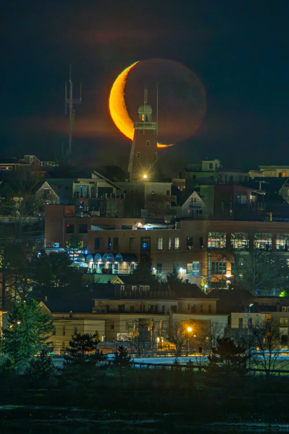 Portland observatory and crescent moon