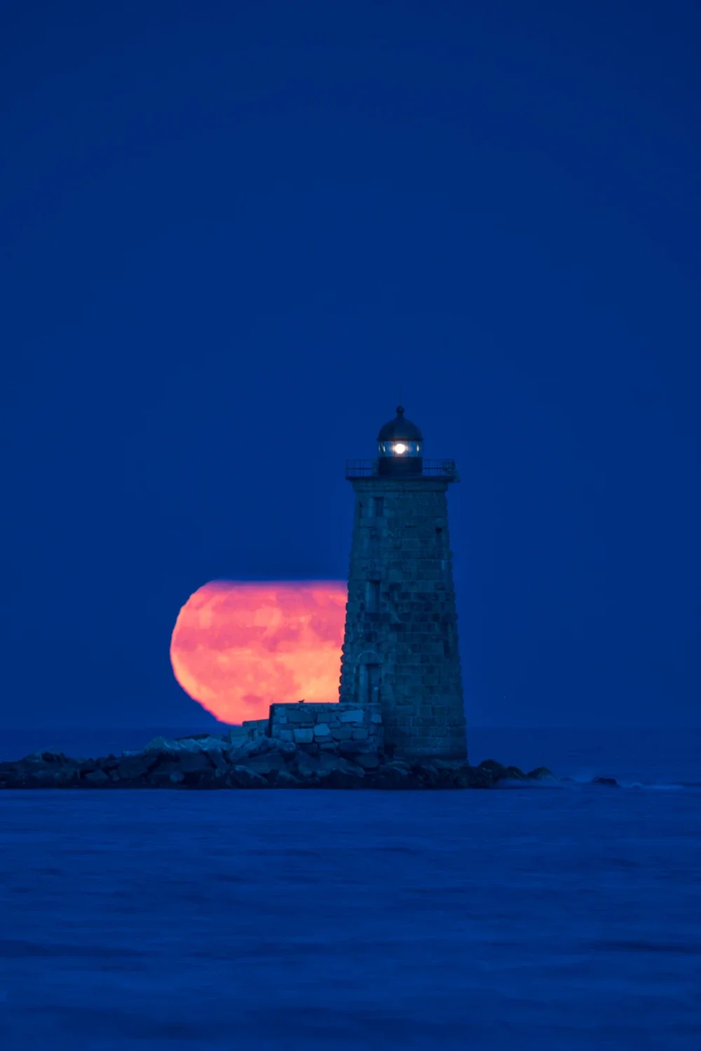 Full sturgeon moon behind Whaleback