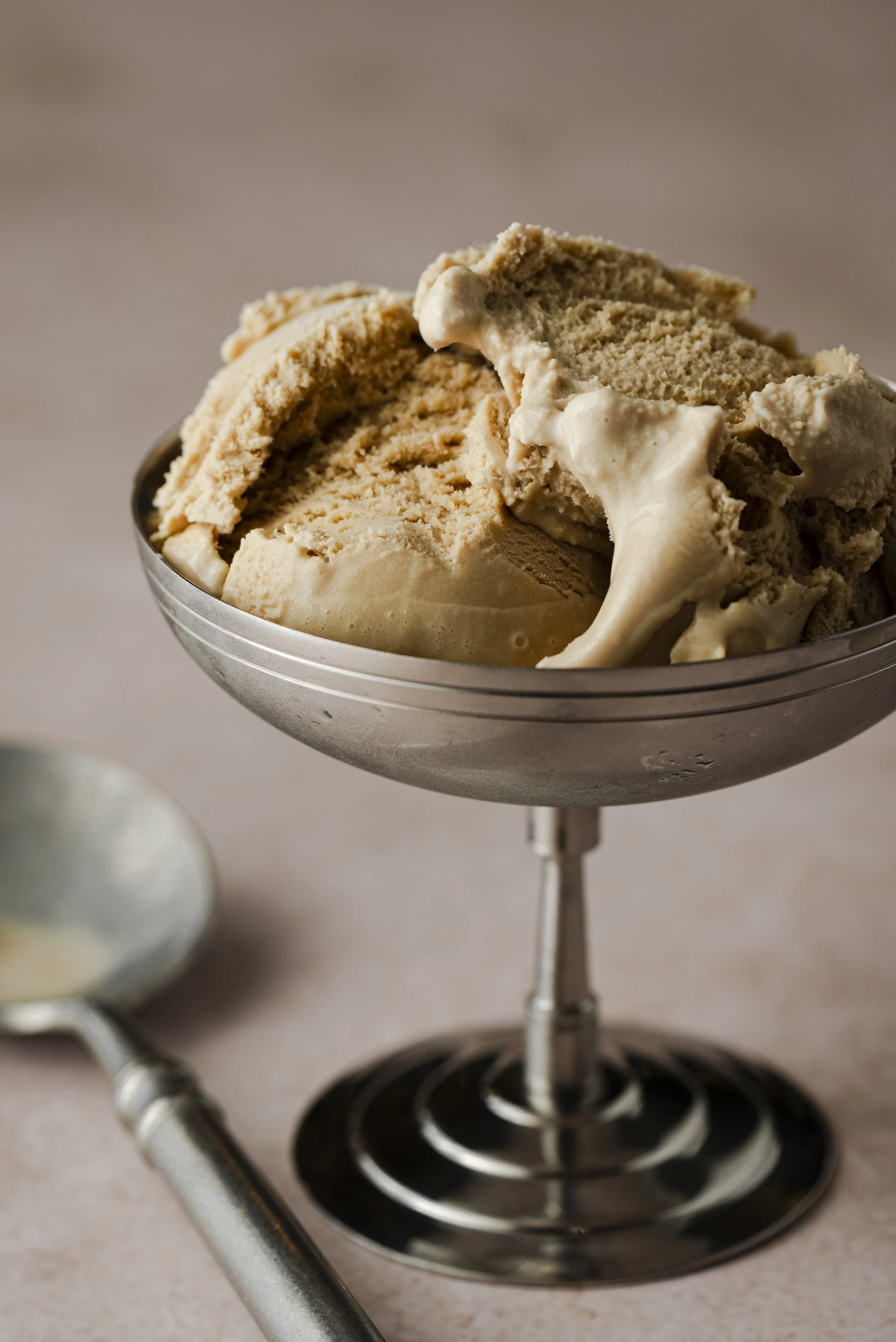 coffee ice cream in a stainless steel coupe.jpg
