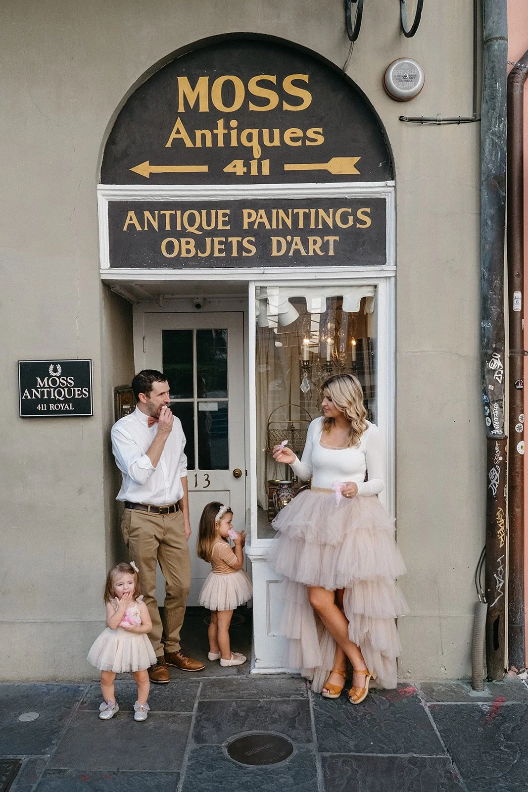 Family photo session in the French Quarter on Royal Street in New Orleans