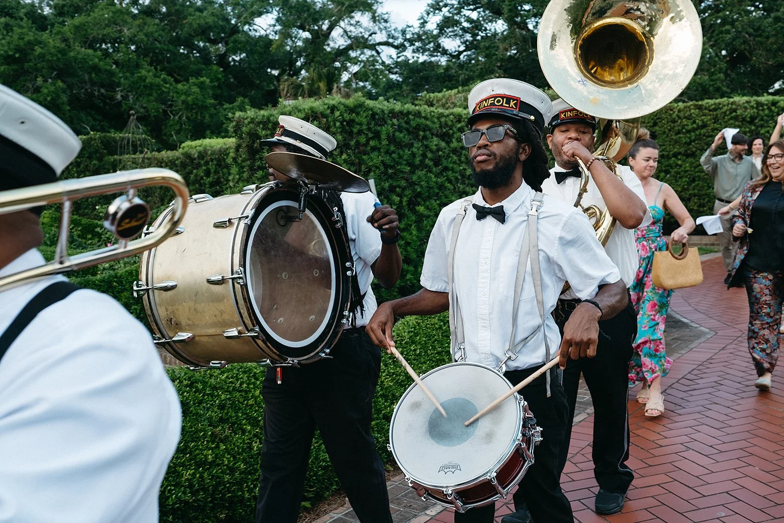 Second Line band leading wedding to the reception at the Botanical Gardens in City Park, New Orleans