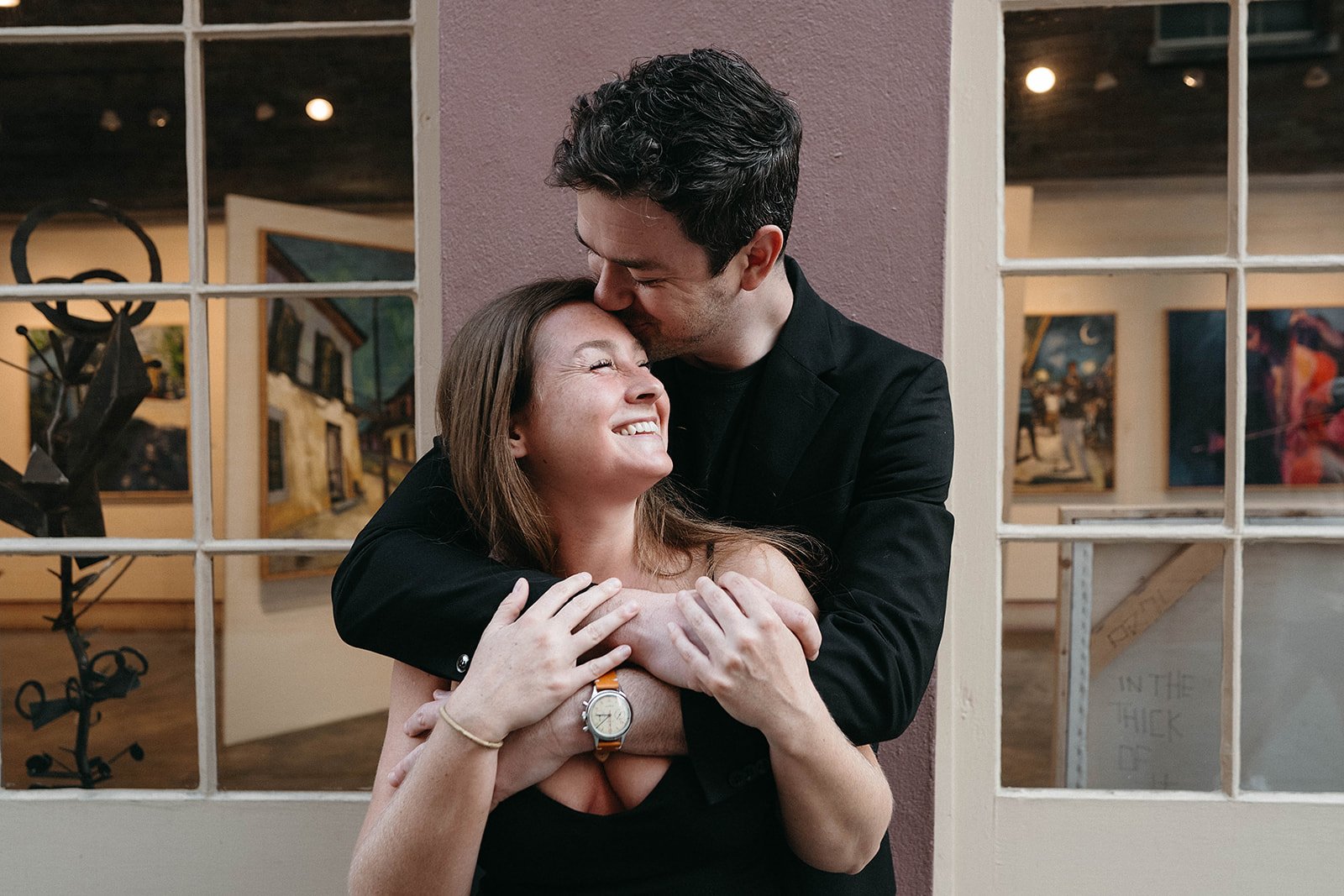 Couple portraits in New Orleans french quarter against Quarter Backdrop