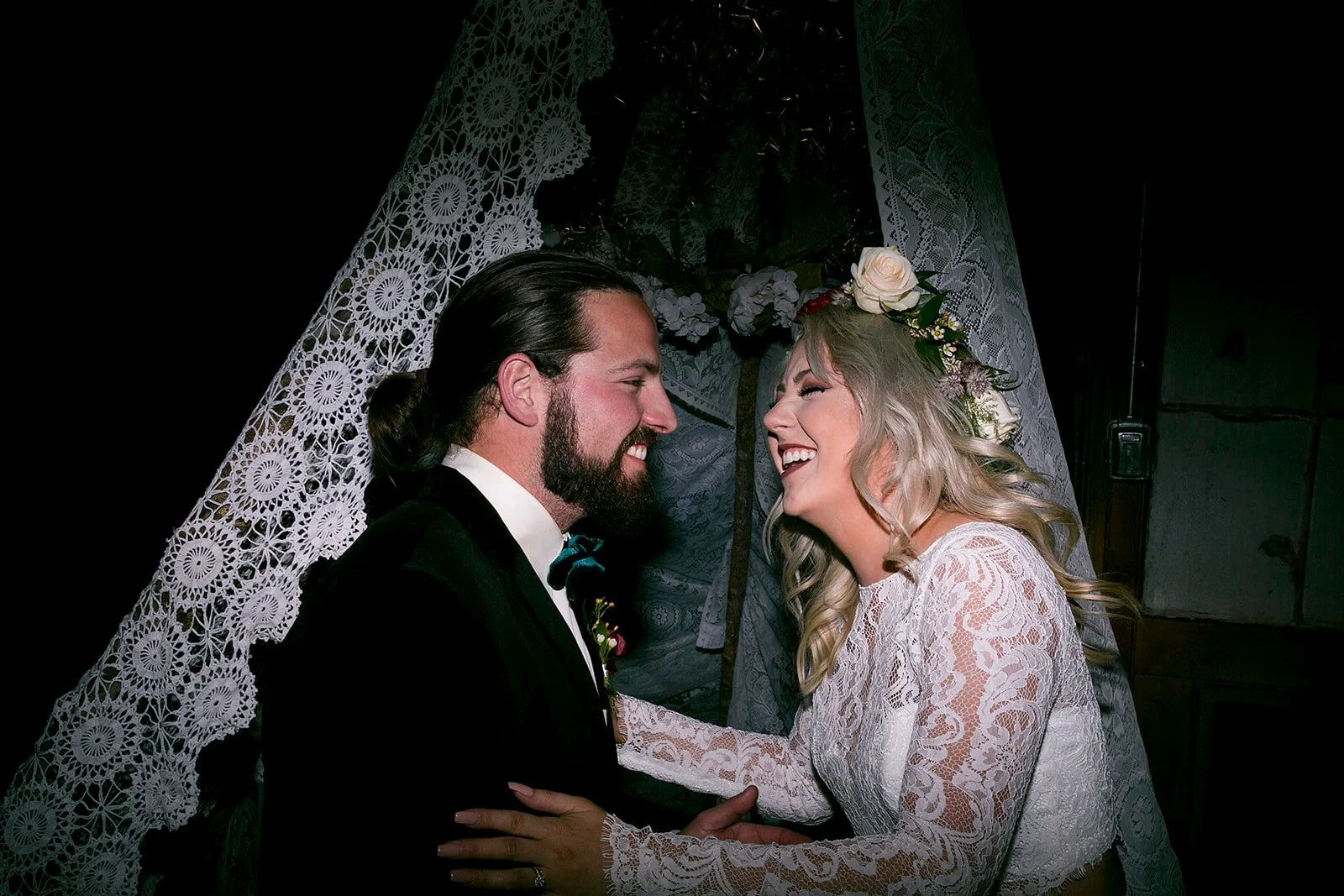 Bride and groom on their wedding day at Il Mercato in the lower garden district in New Orleans