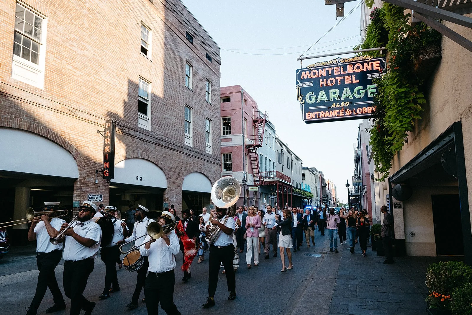 Second Line on a wedding day in the French Quarter next to the Hotel Monteleone in New Orleans