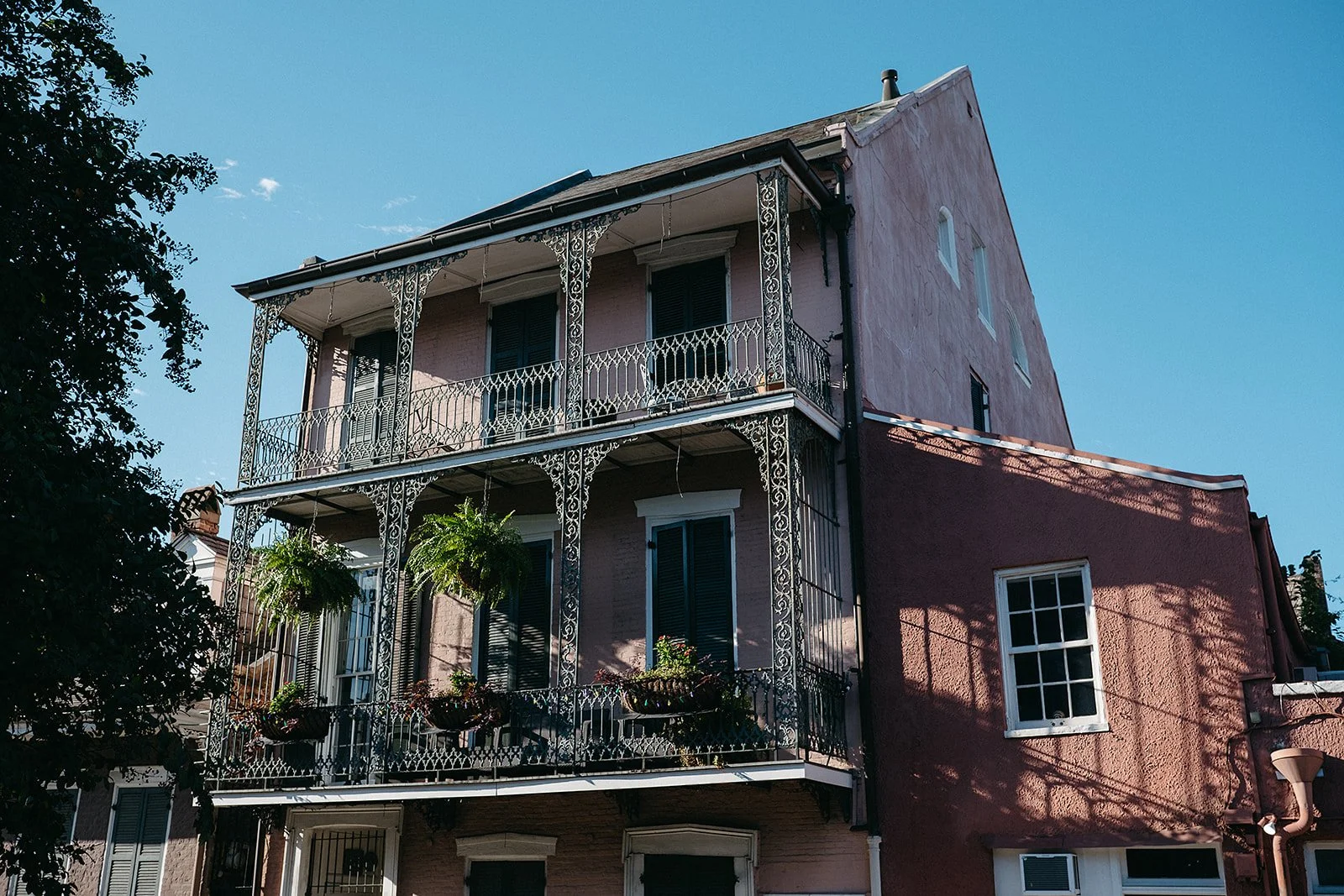 City vibe in the French Quarter, New Orleans. Amazing balconies. 