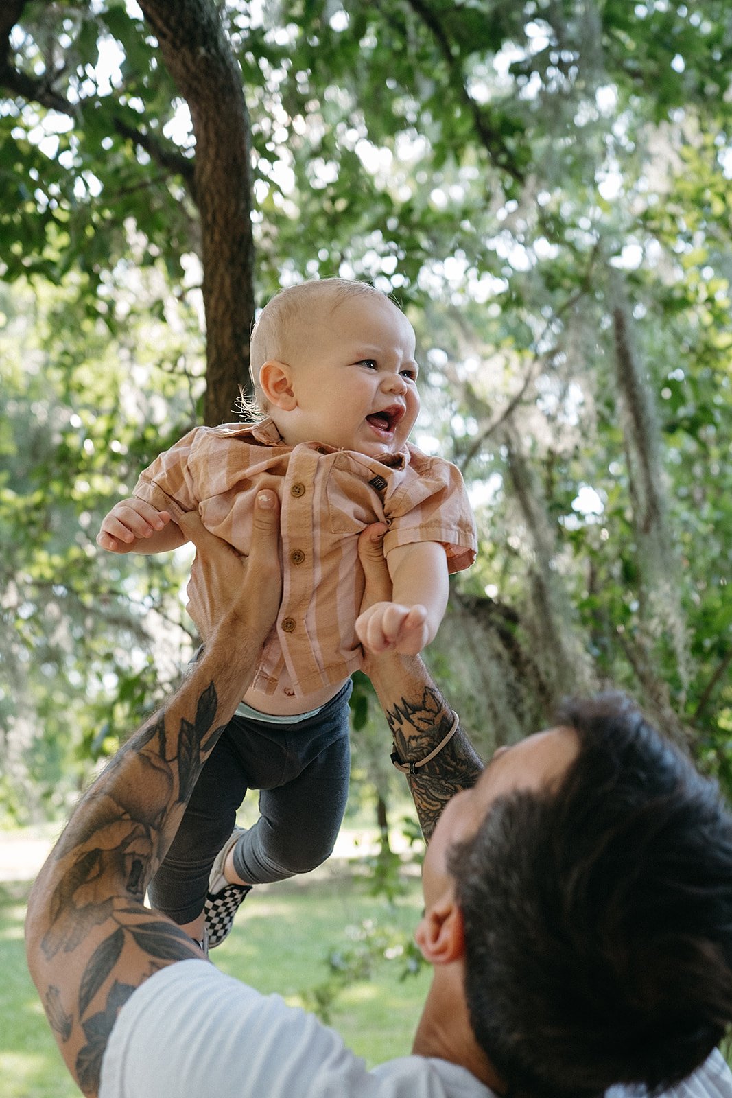Father and son during family photo session in City Park, New Orleans