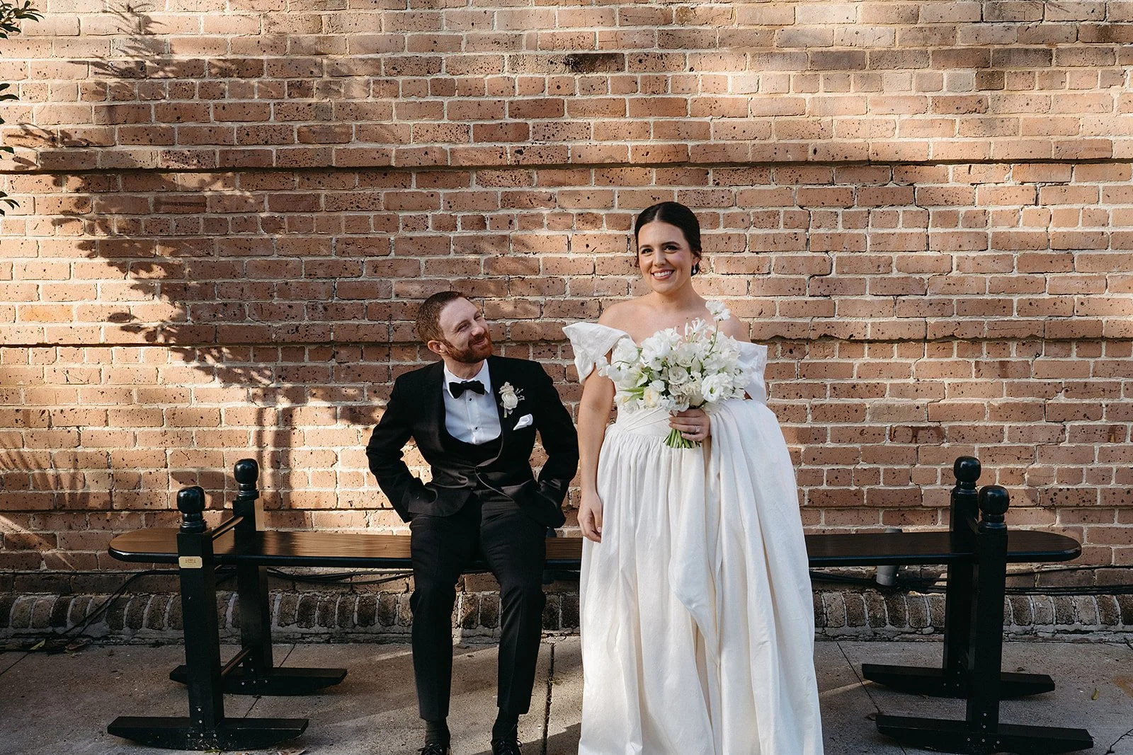 Bride and groom on their wedding day taking a moment before the ceremony at Hotel Peter & Paul in the Faubourg Marigny, New Orleans 